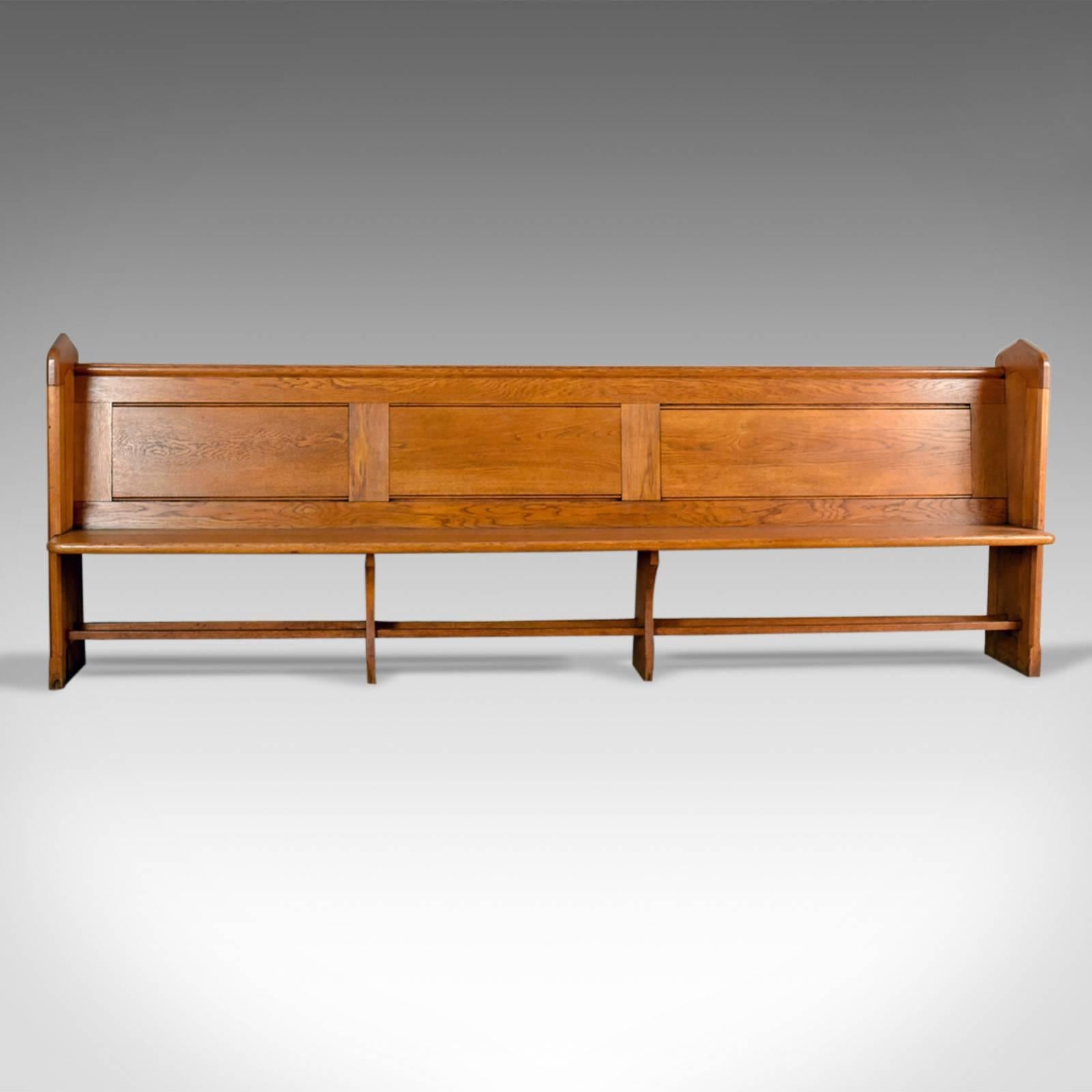 This is an antique pew, an English, oak, Victorian church bench with Pugin-esque Gothic overtones dating circa 1880.

Attractive honey tones to the English oak with a desirable aged patina
Displaying grain interest through the wax polished