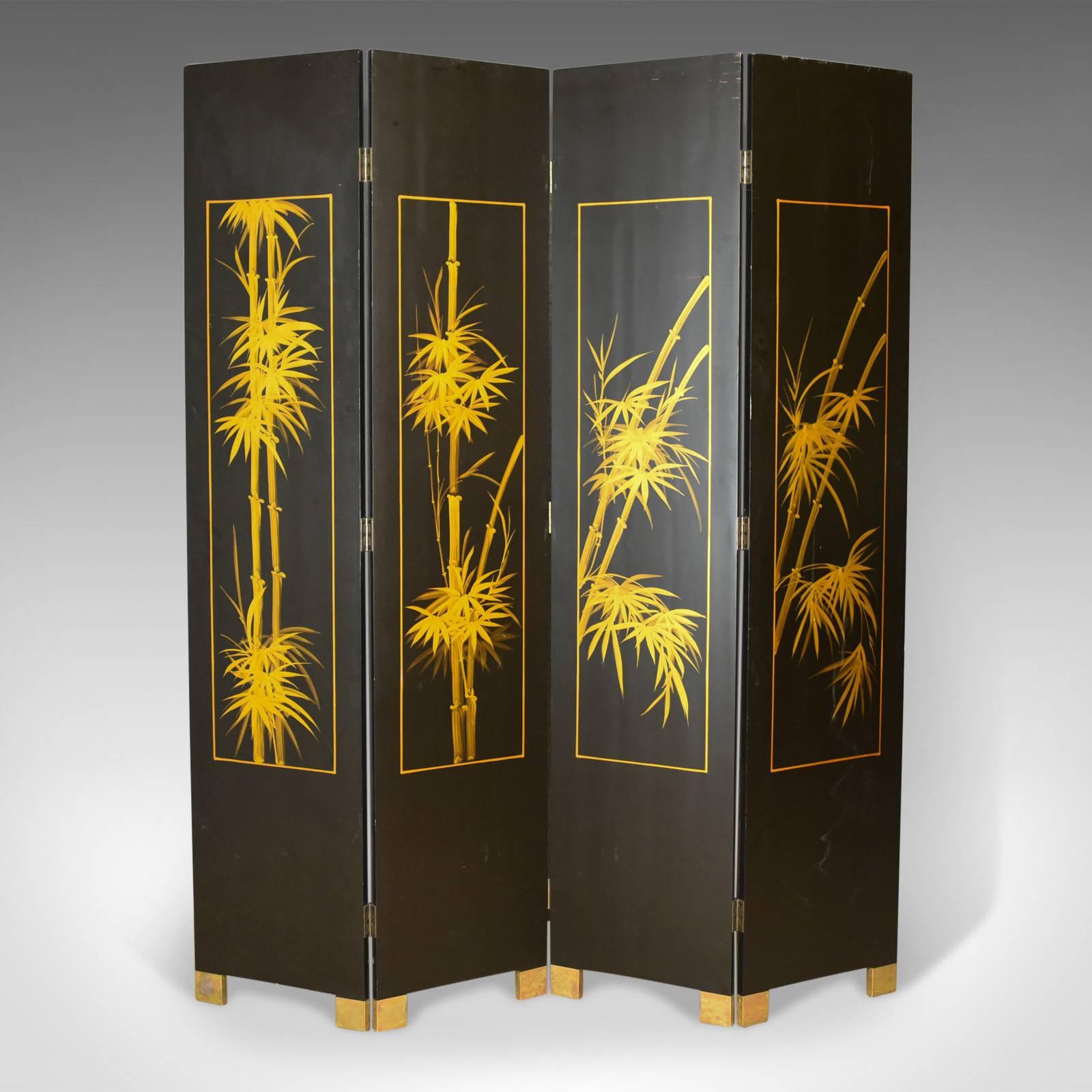 This is an oriental, four panel, folding screen, a double sided room divider or partition dating to the late 20th century. 

Astonishing detail to the profusely decorated screen
A scene of a bridge over a river featuring boats, marketplaces and