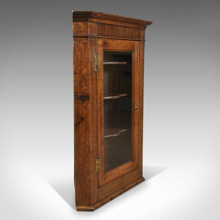 Antique Corner Cabinet, Oak, Mahogany Georgian, Glazed, Hanging This is a fine example of an antique corner cabinet in oak and mahogany, English - Antique Corner Cabinet, Oak, Mahogany Georgian, Glazed, Hanging
