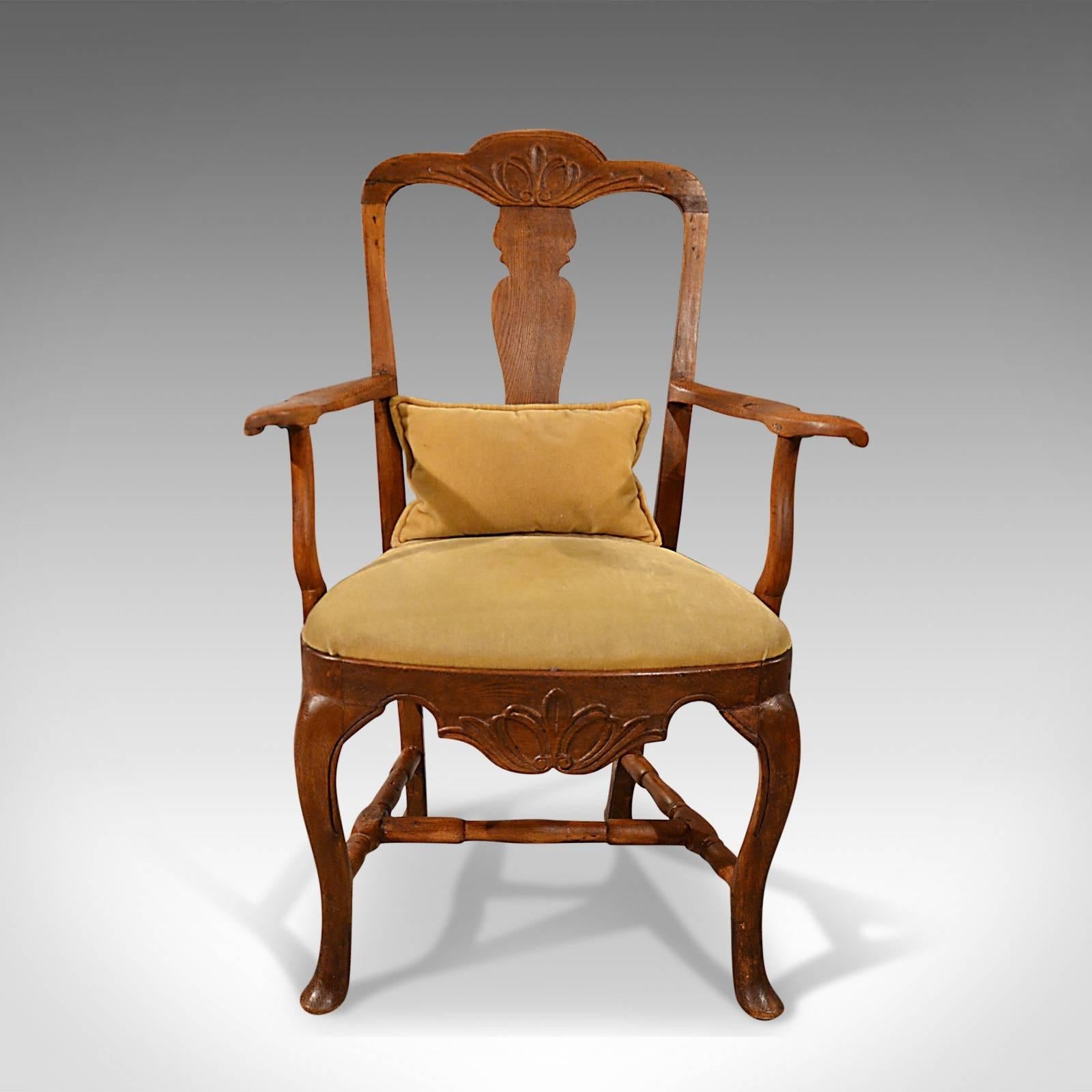 This is an antique elbow chair. A large example in oak, ash and elm ideal as a study desk chair. A Georgian armchair dating to circa 1800.

A superior antique chair presented in very good condition
In oak, ash and elm with fine color