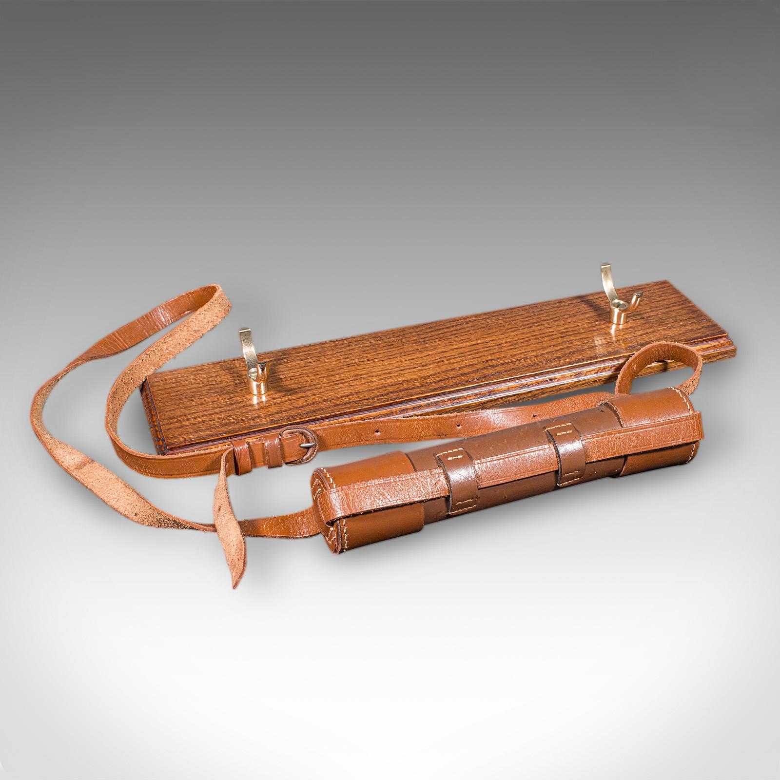 This is a vintage 3-draw telescope. An English, leather and brass navigational or astronomical instrument, dating to the early 20th century, circa 1930.

Perfect for bird watching, landscape appreciation, wildlife, or maritime observation. Equally