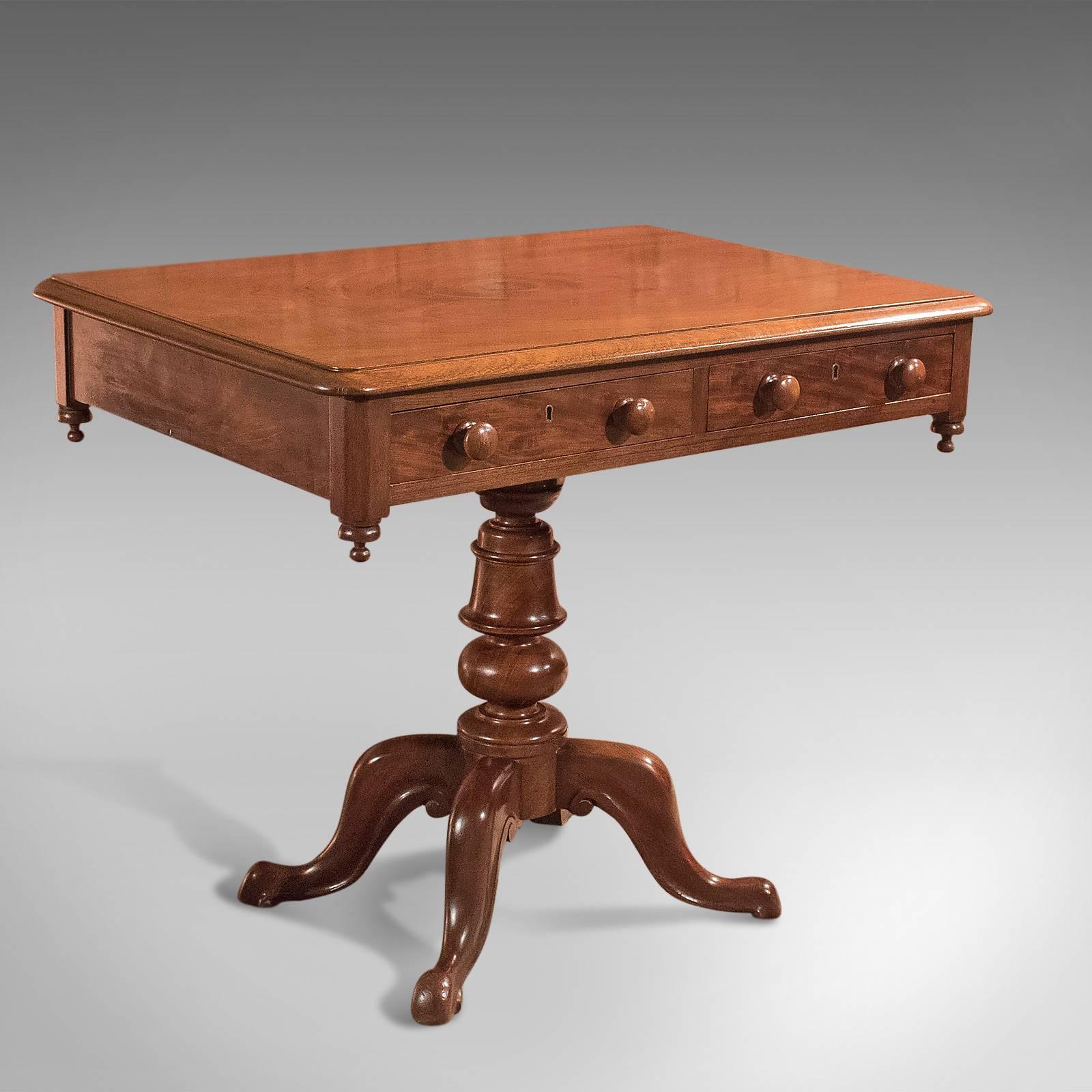 This is a fine, mid-sized side table dating to the Victorian period, circa 1880.

Beautiful grain detail to the polished, light mahogany finish.
Broad top with moulded edge detail.
Frieze in good proportion dressed with descending finials to