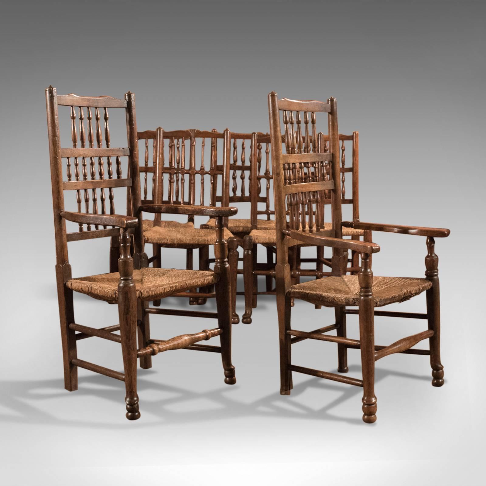 British Harlequin Set of Seven Antique Spindle Back Dining Chairs, circa 1800