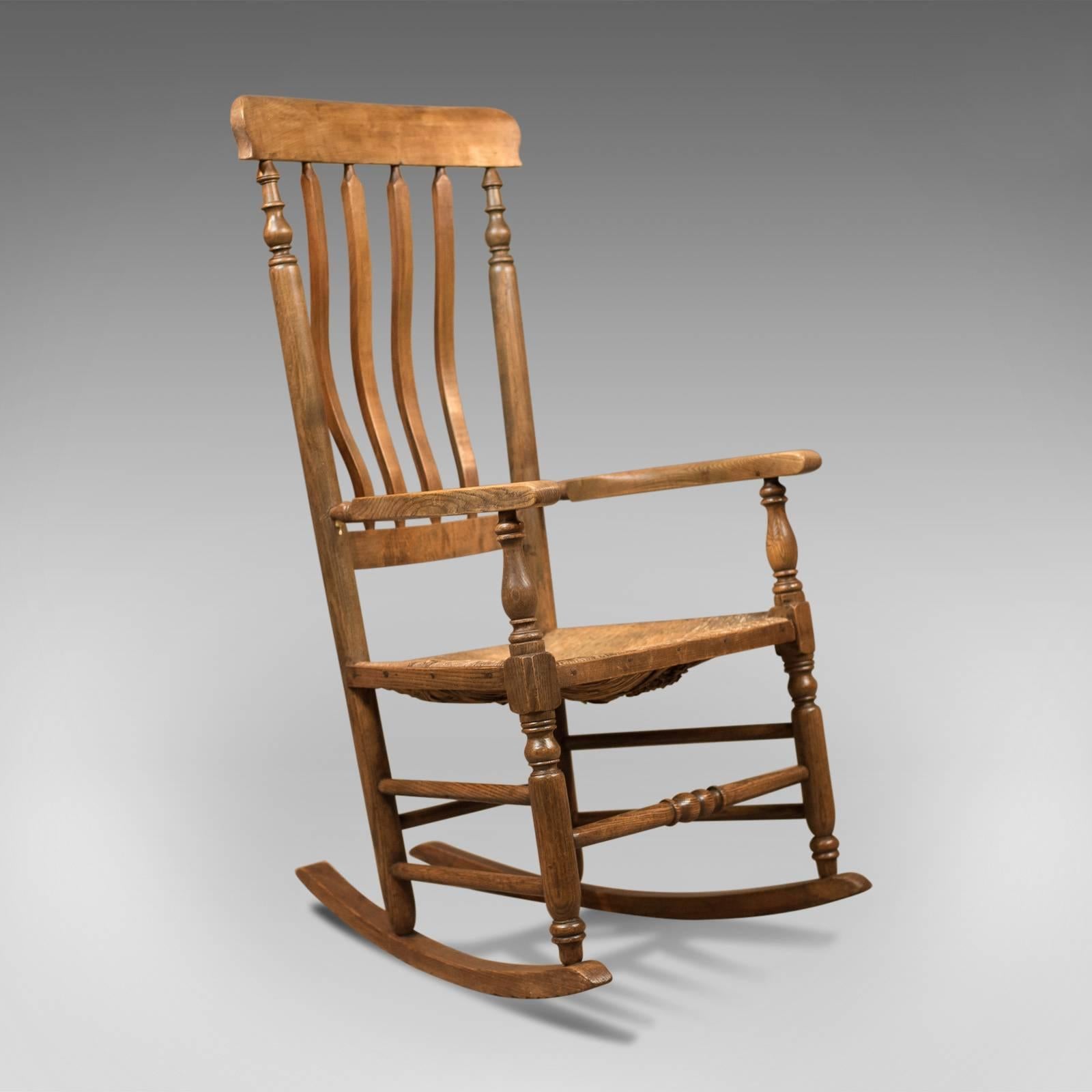 This is a delightful, country, antique rocking chair dating to the late Georgian period, circa 1800.

Beautifully crafted in English oak and ash
Good graining and a desirable aged patina
Strength from the box stretcher decorated with a simple