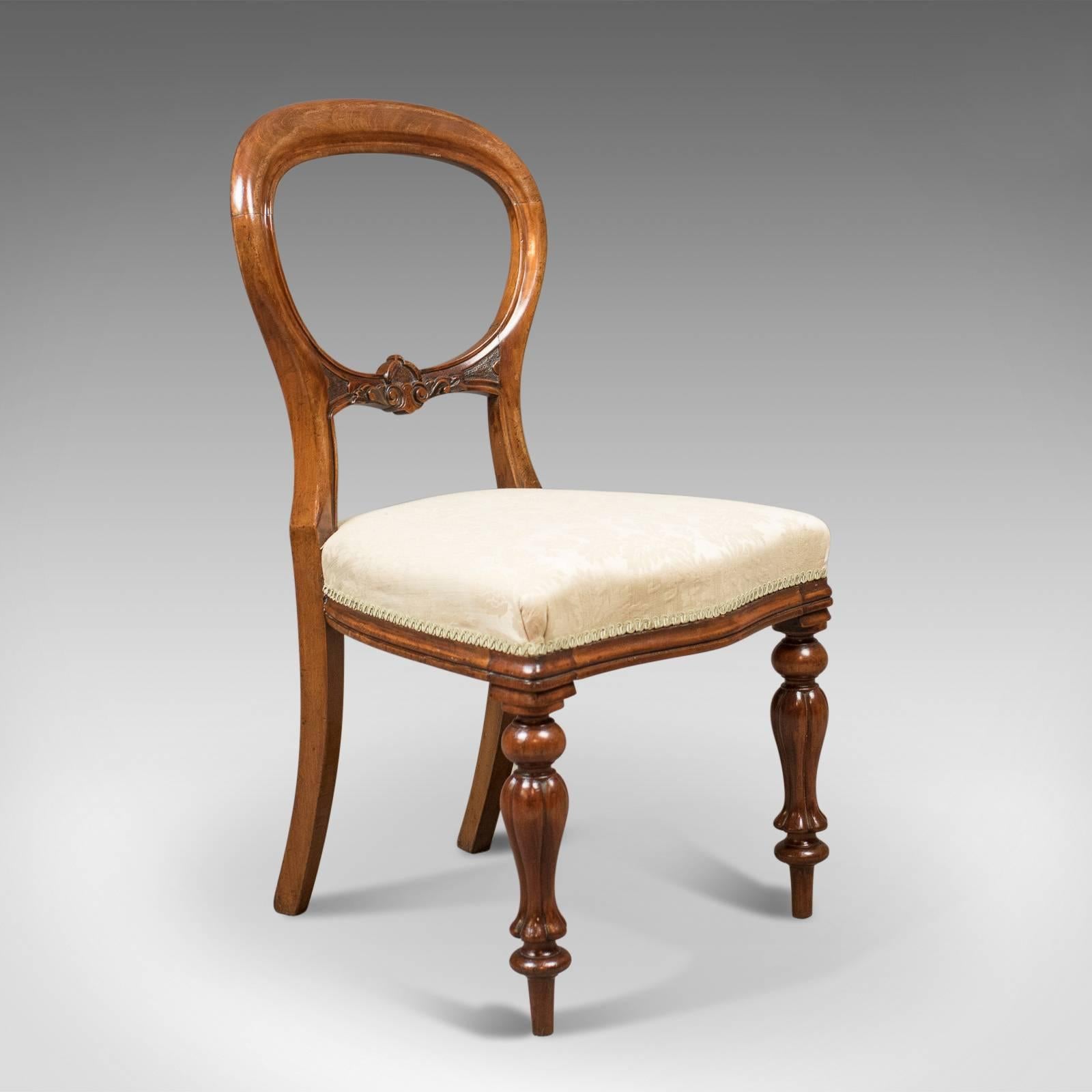 This is an antique chair, early Victorian buckle dating, circa 1840.

Top quality mahogany with excellent color and good proportion
Displaying good grain interest and an aged patina
Exhibiting transitional design from buckle to balloon