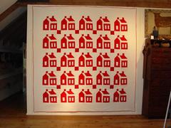 White and Red Schoolhouse Quilt with Crisp Houses