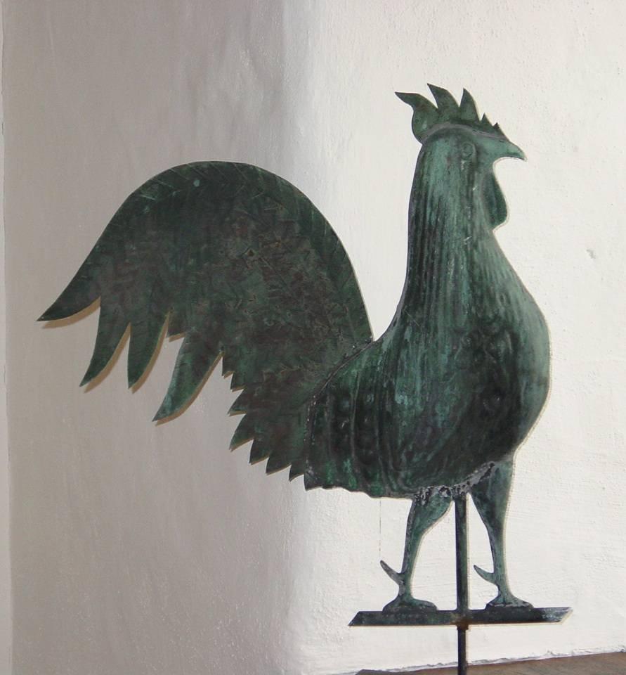 A molded and sheet copper rooster Folk Art weathervane with traces of gilt and green patina. Of desirable, reduced scale, this rooster weathervane is a classic example of Folk Art sculpture.