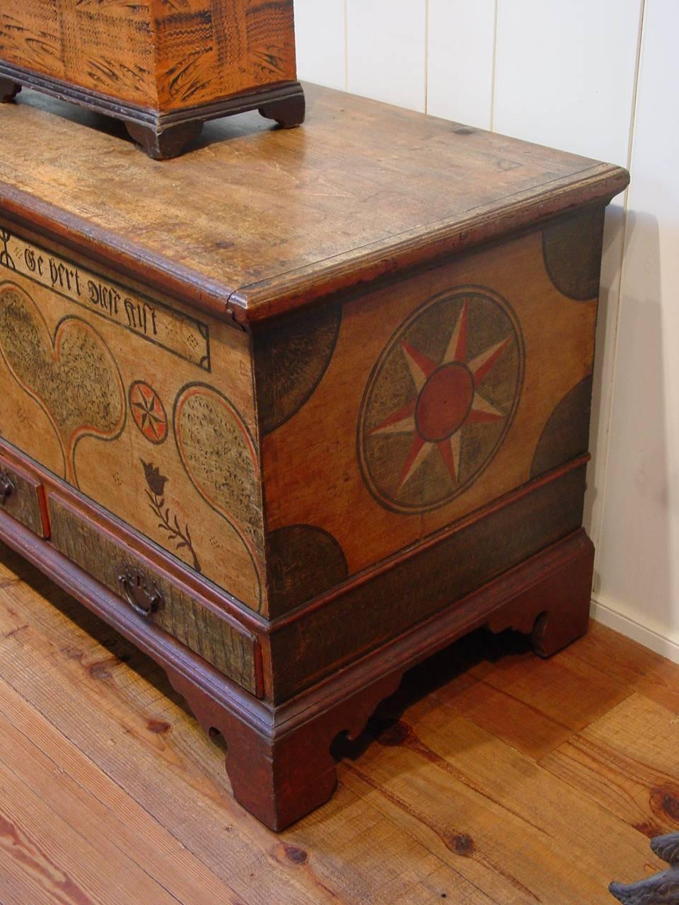 An exceptional Pennsylvania polychrome-painted dower, or blanket, chest inscribed in German and dated 