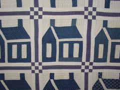 Blue and White Calico Schoolhouse Patchwork Quilt