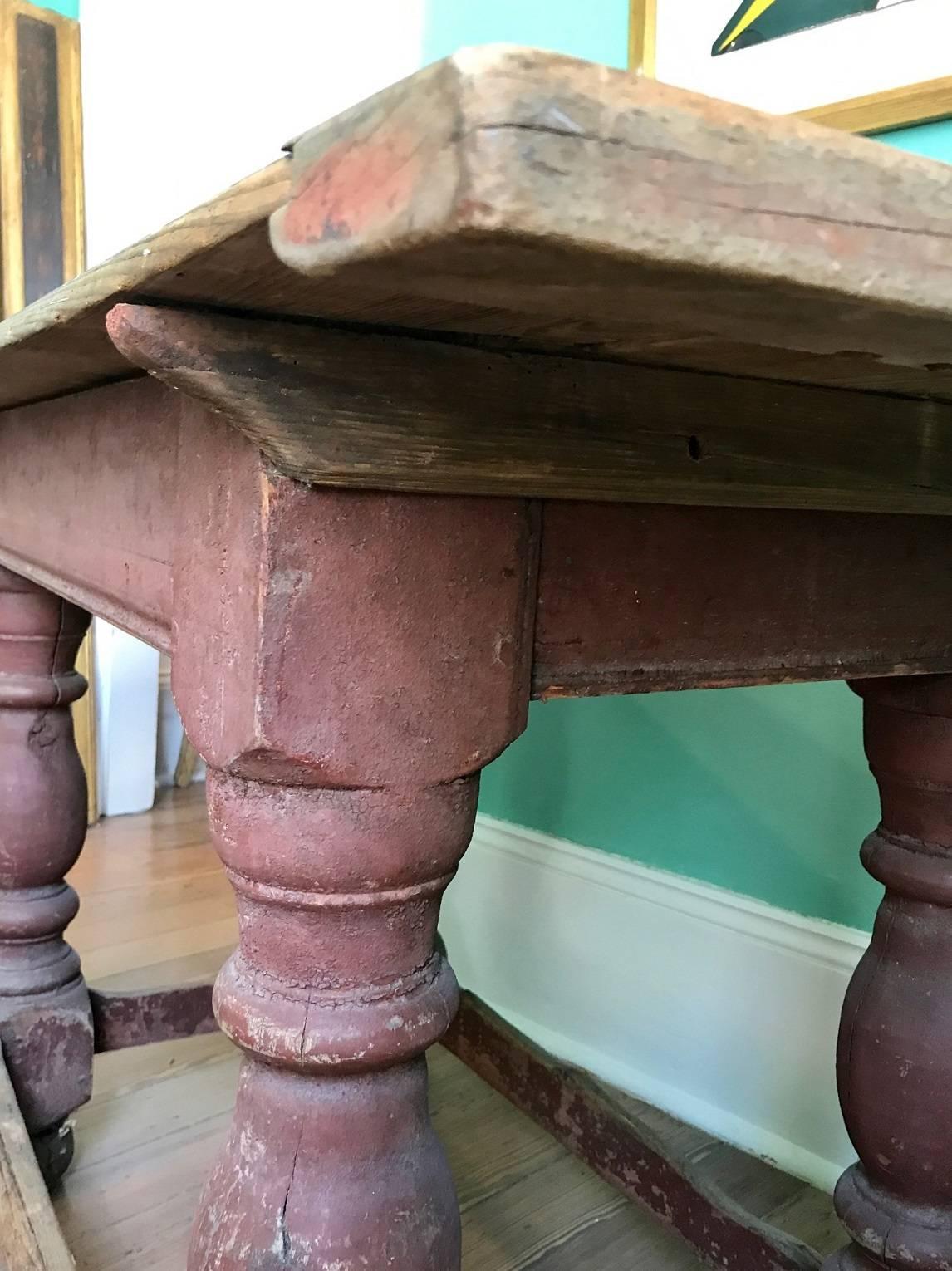 Handsome Swedish Baroque console table; robustly turned legs ending in bun feet connected by horizontal stretchers; beaded skirt with crossbars to support the removable plateau.