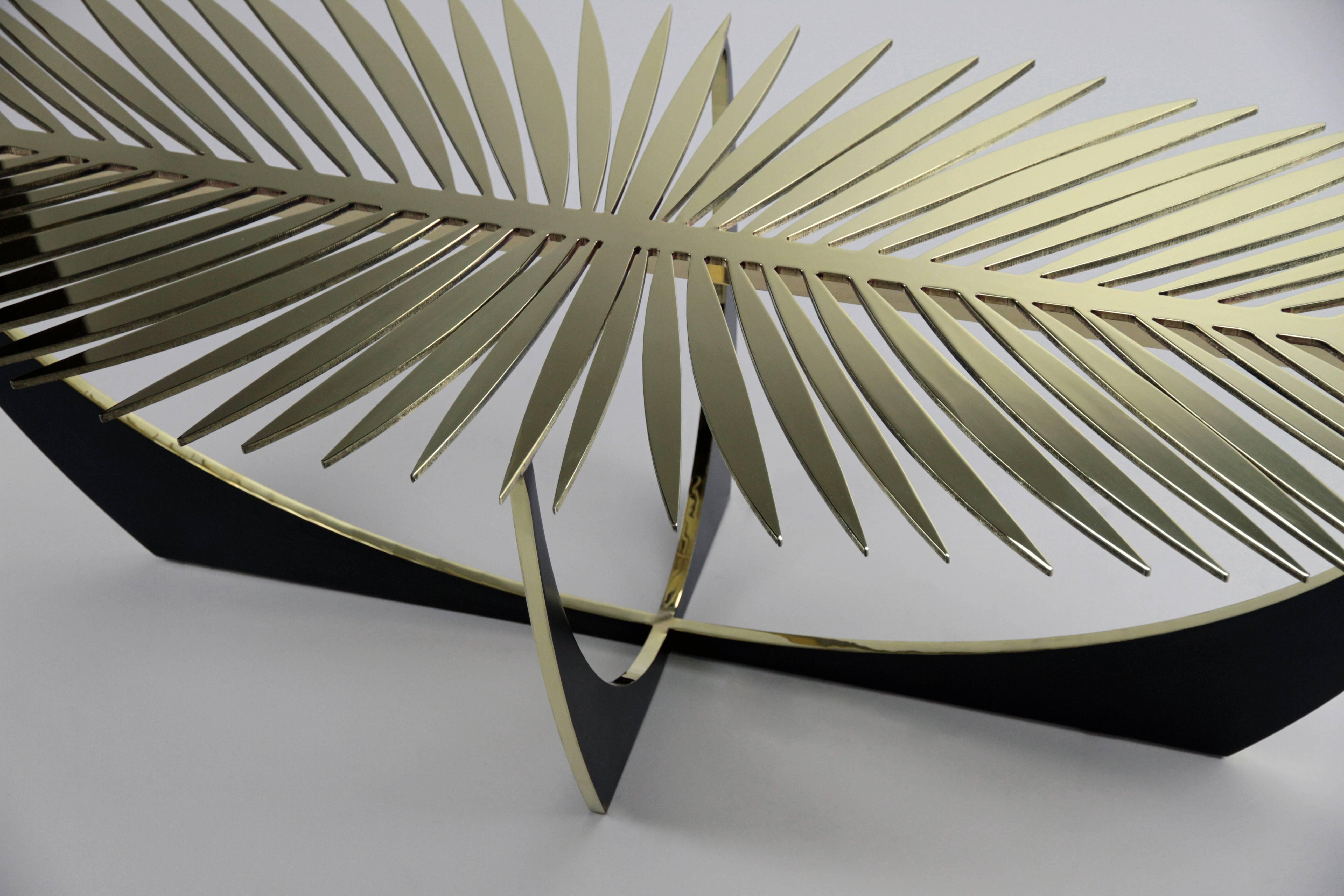 The Double Frond Coffee table is made of solid brass. 
The tabletop and edges of the base are high polished and waxed. The base sides have a blackened patina. 
The table works well sculpturally without glass but can be ordered with a 1/4 inch