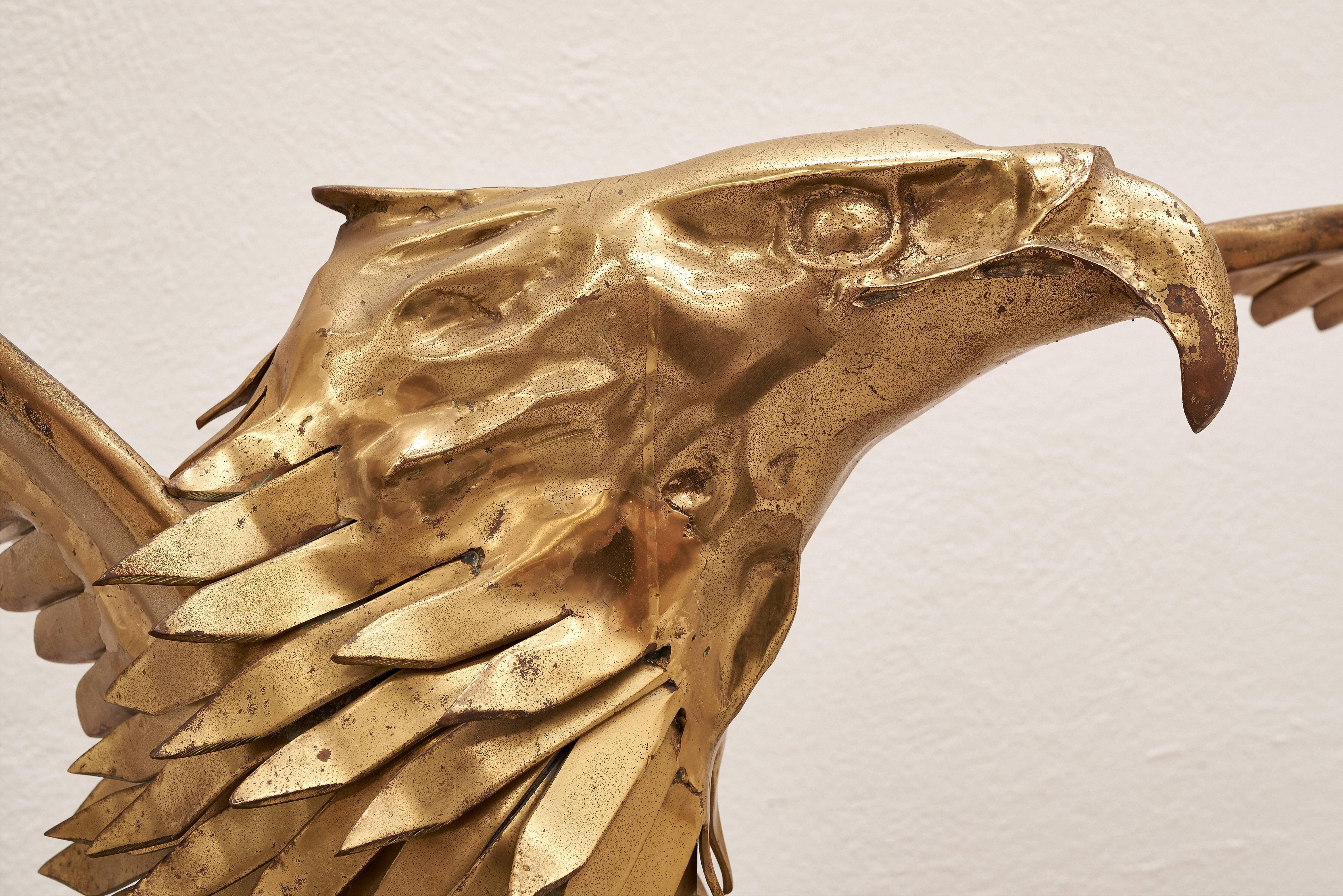 Magnificent eagle brass sculpture console table by Christian Techoueyres for Maison Jansen.

Designed in 1980s, this unique piece was presented at the world famous Milan, Italy design exhibition Salone del Mobile by Maison Jansen, a Paris-based