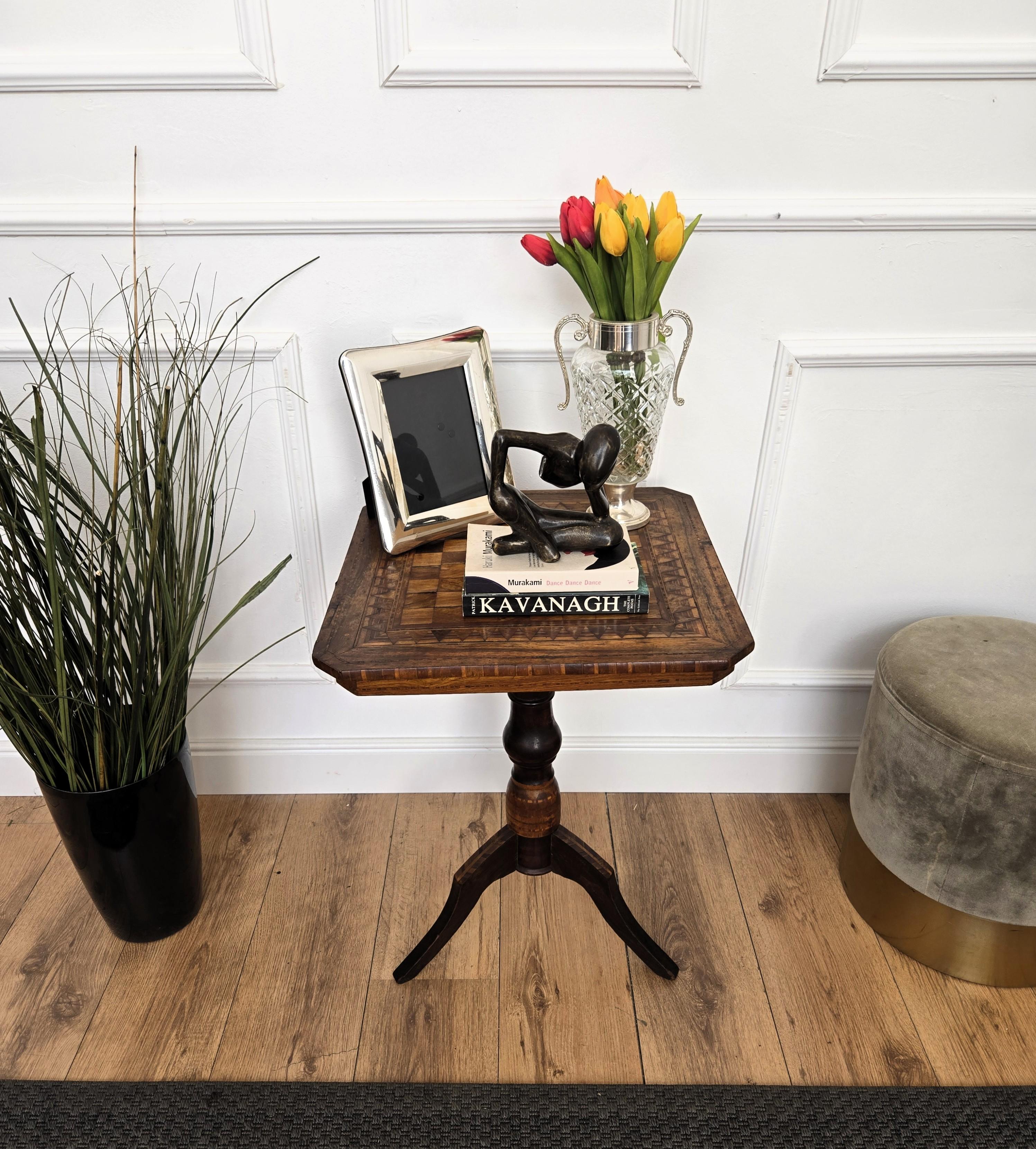 A beautiful Italian walnut side table with great details and frames shaped in Victorian, Napoleon III, Louis XV style with chessboard on the top and the tripod feet legs. A very elegant, modern and classic piece that showcases the refined