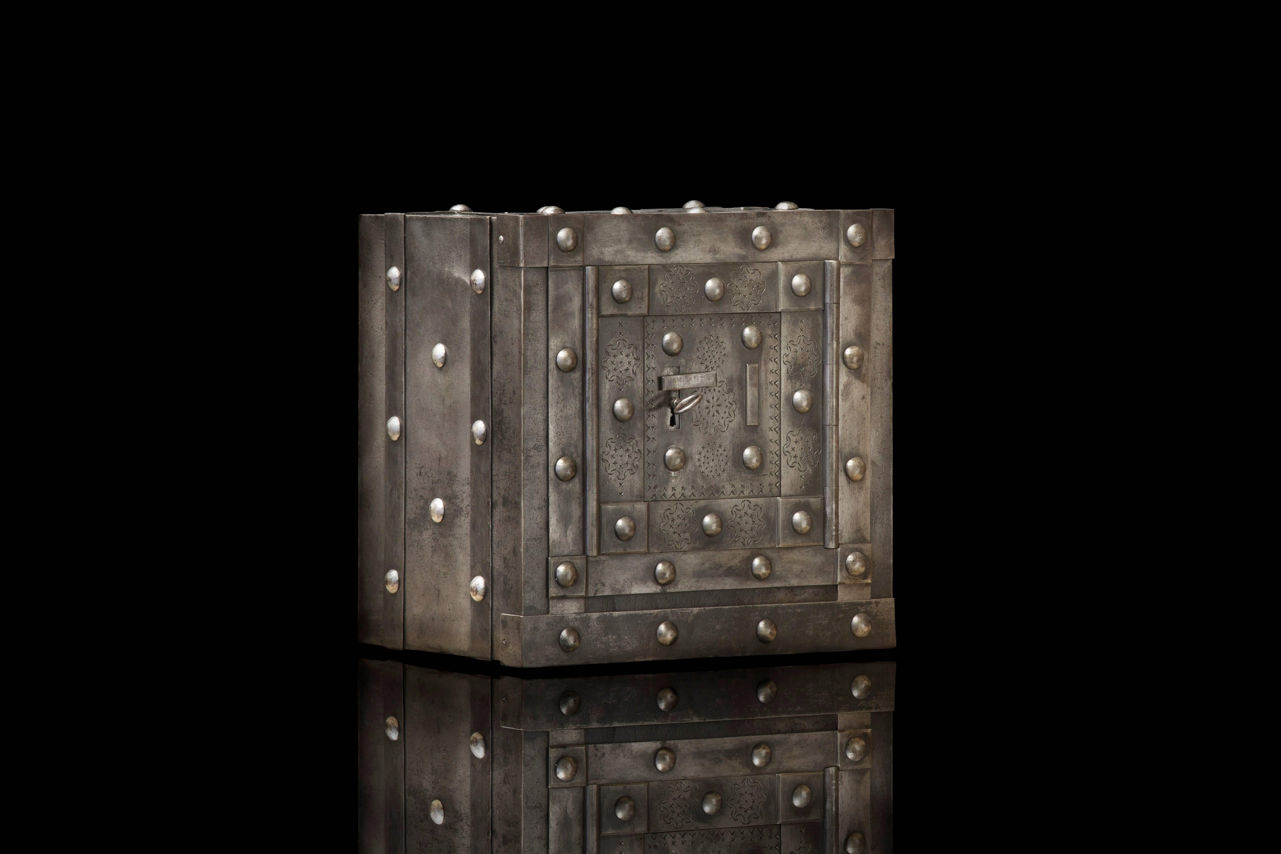 Northern Italian mini-hobnail safe, desk top size, circa 1810-1830. This almost 200 year old safe has an original and working key lock door, with a hidden release to expose the key hole and a secret sequence to follow with the key to activate the