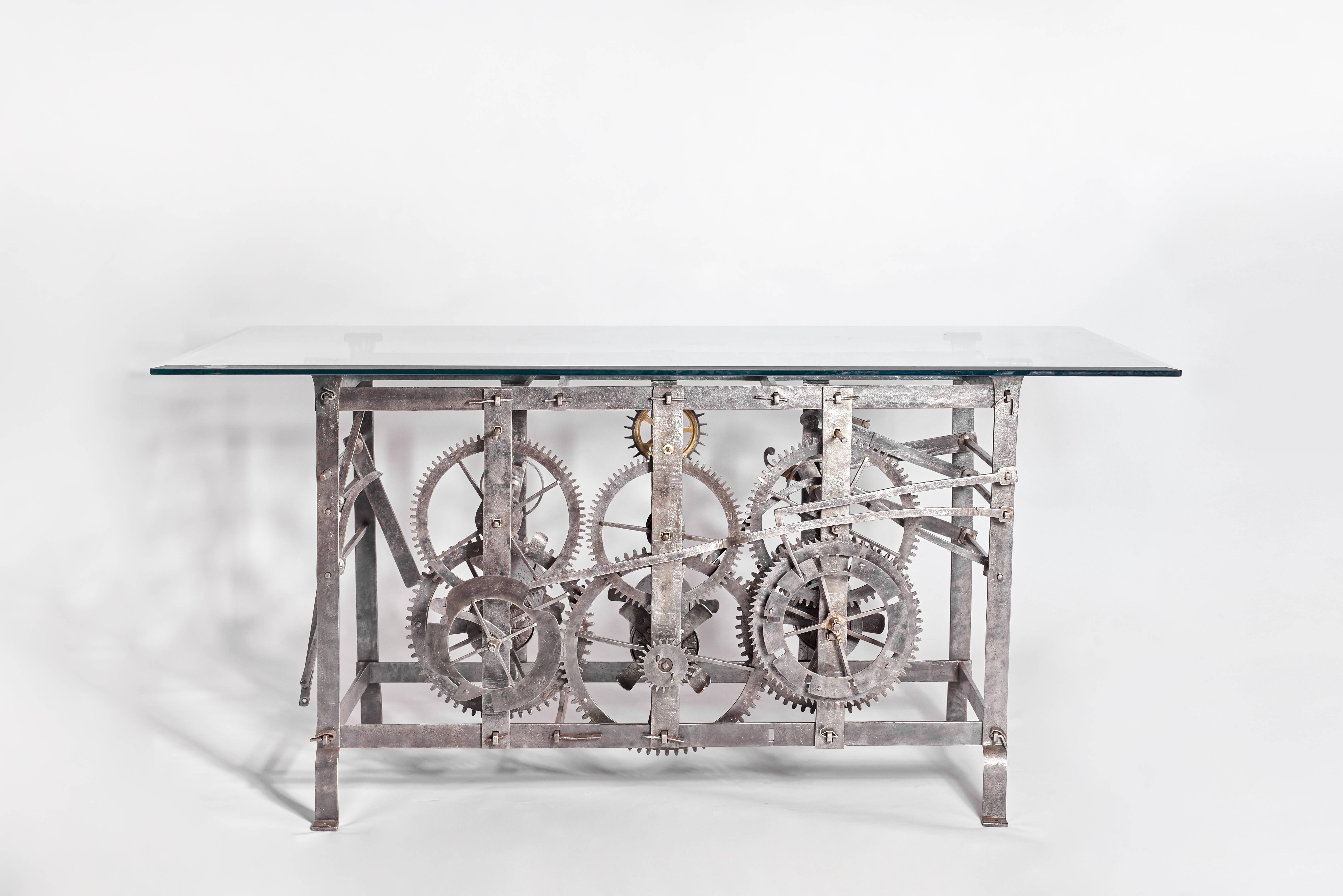 Beautiful table designed from an authentic 18th century Italian tower turret clock mechanism. This mechanism was used for large clocks and bells you find up churches and public towers to keep time for the Community. 

The mechanism is included in