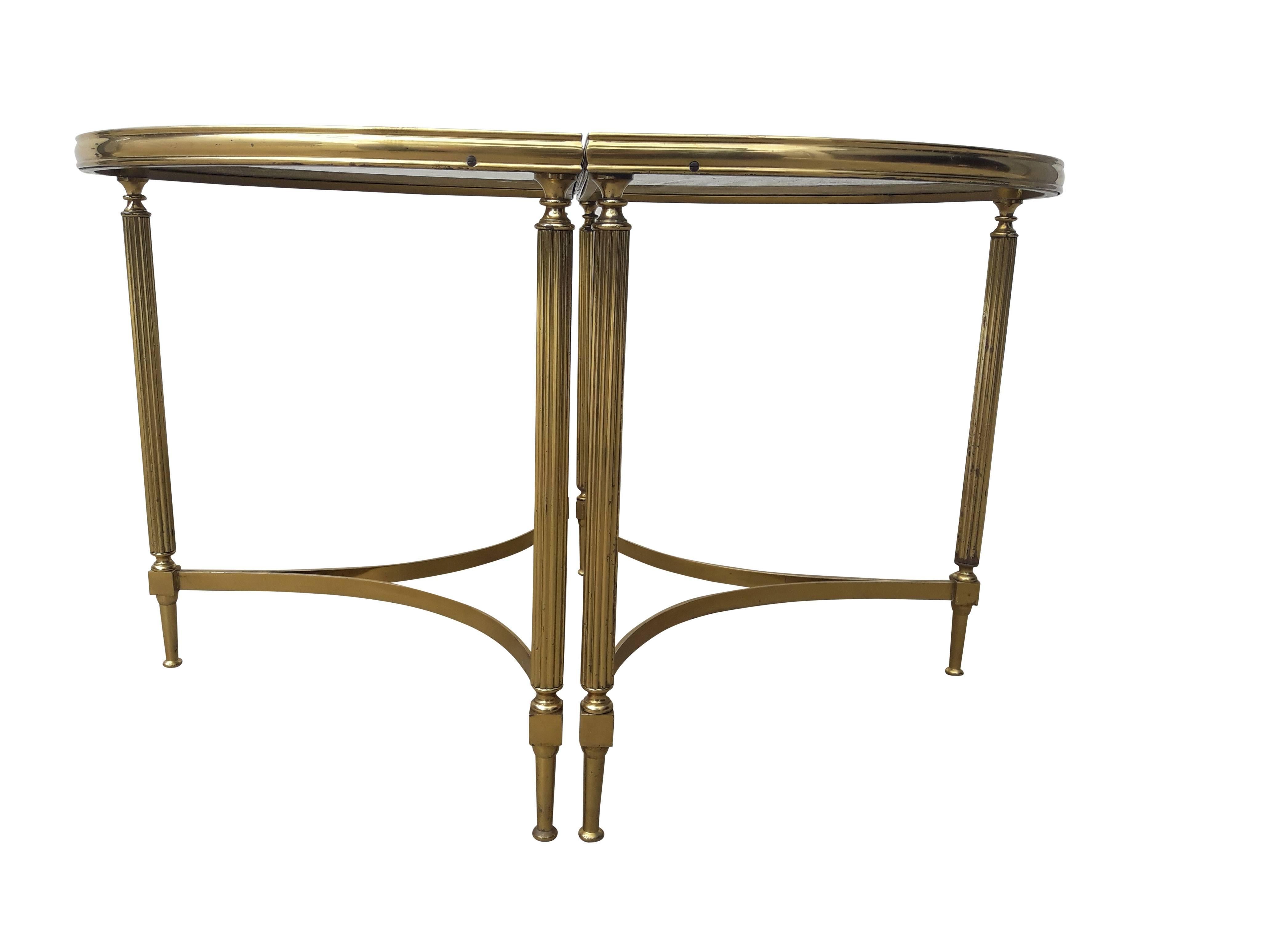 Pair of vintage brass side tables in the style of Maison Jansen.
Made in France in the 1970s.