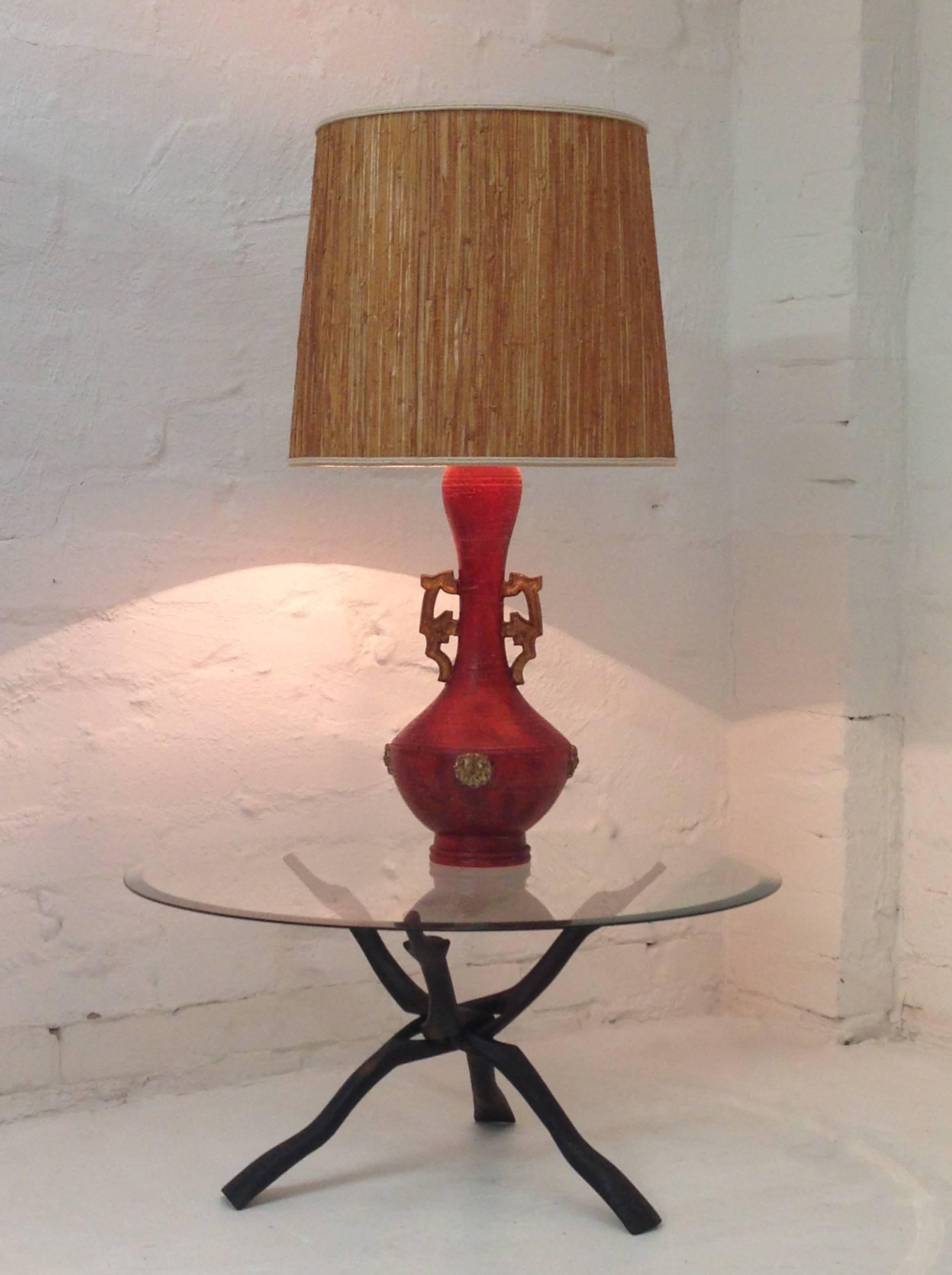 This absolutely stunning lamp is an item of high quality and exaggerated style. The attention to detail in the construction of the lampshade alone is wonderful to see. If you want to set a mood of nostalgic decadence and richness, look no further,