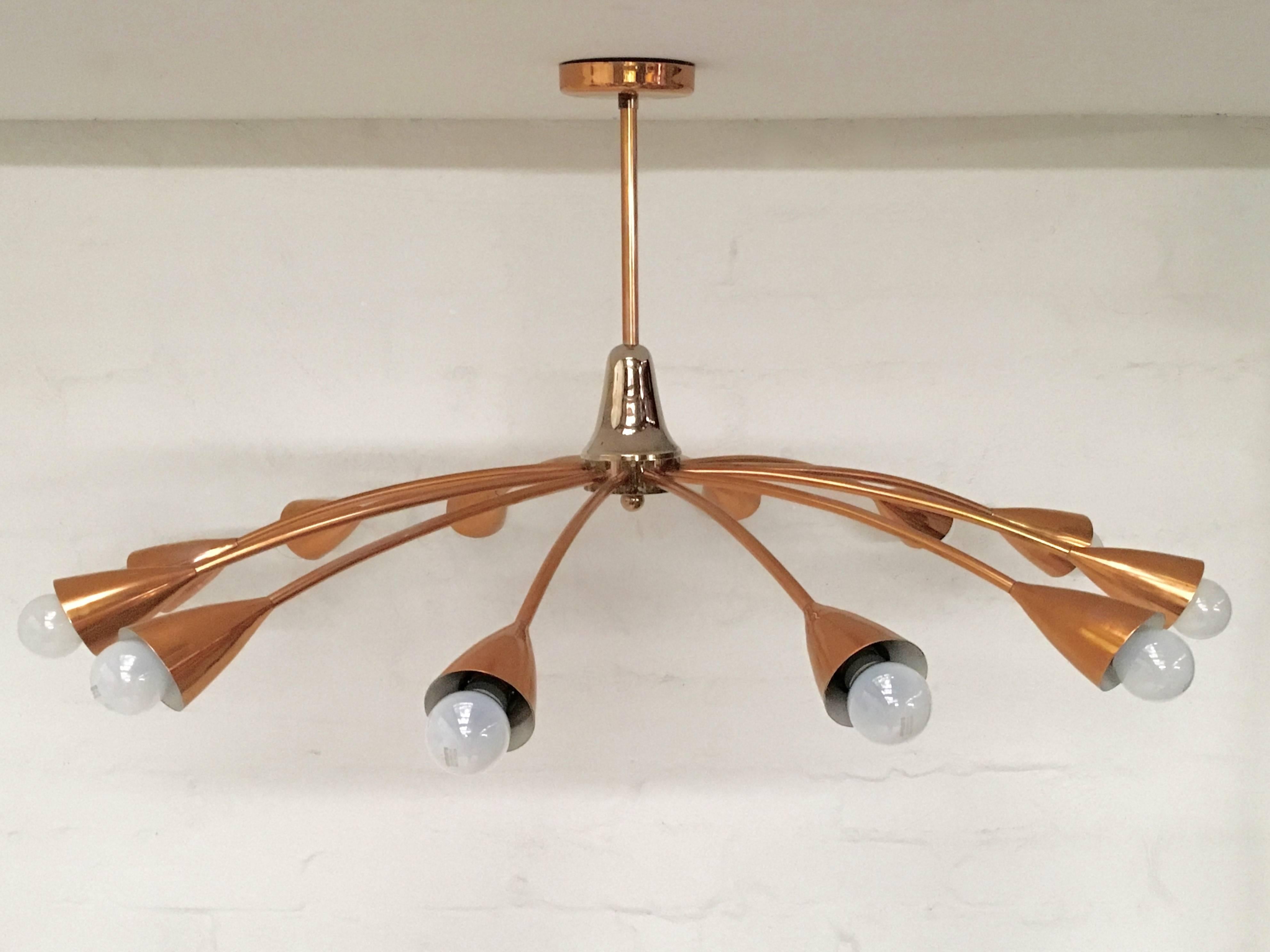 This magnificent copper chandelier in the style of Stilnovo was a private commission for a 1950s Melbourne architectural project in Caulfield. The lighting was designed and produced by Brown Evans and Co. (BECO) in close consultation with the