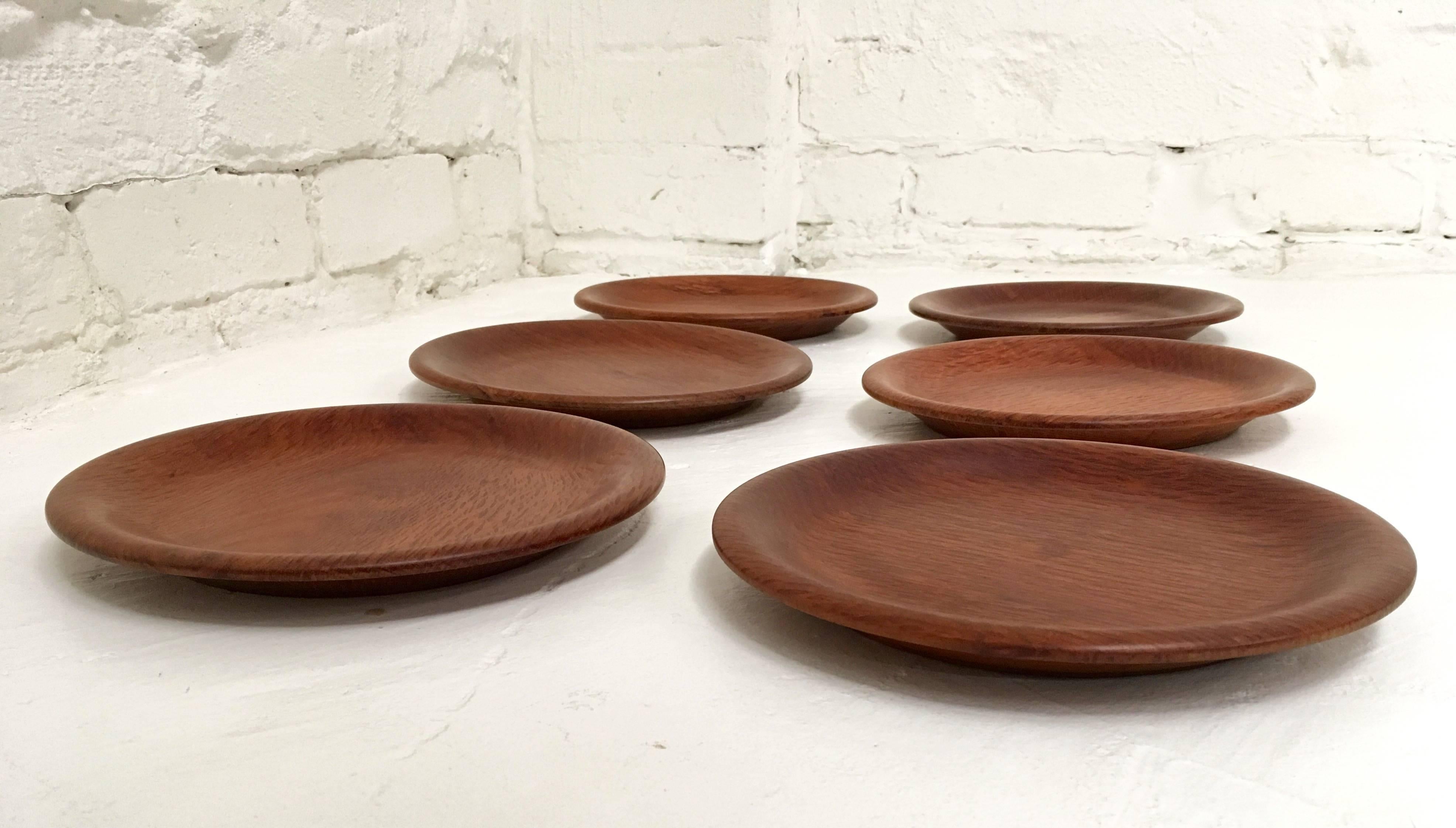 This beautiful set consists of six hand-turned Australian She-oak timber medium sized dinner plates. The quality of she-oak or Casuarina timber makes it an attractive material for woodturning, with it's deep golden to umber tones and beautiful,