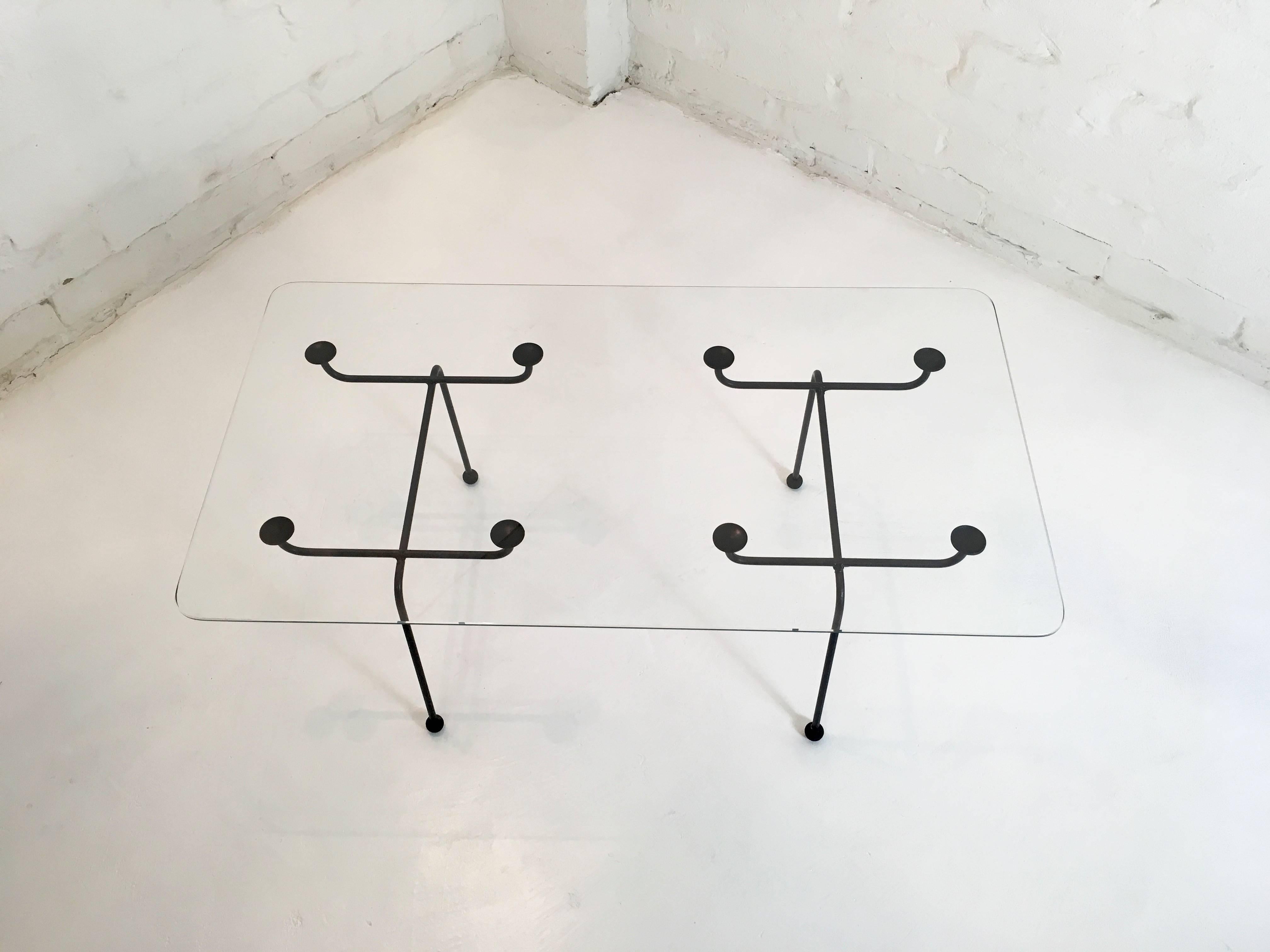 This exceptionally rare early Meadmore table has a light and playful presence. It reflects Meadmore's uncanny understanding of space and geometry which was to emerge more robustly in his stellar career as a sculptor.

His official website tells us