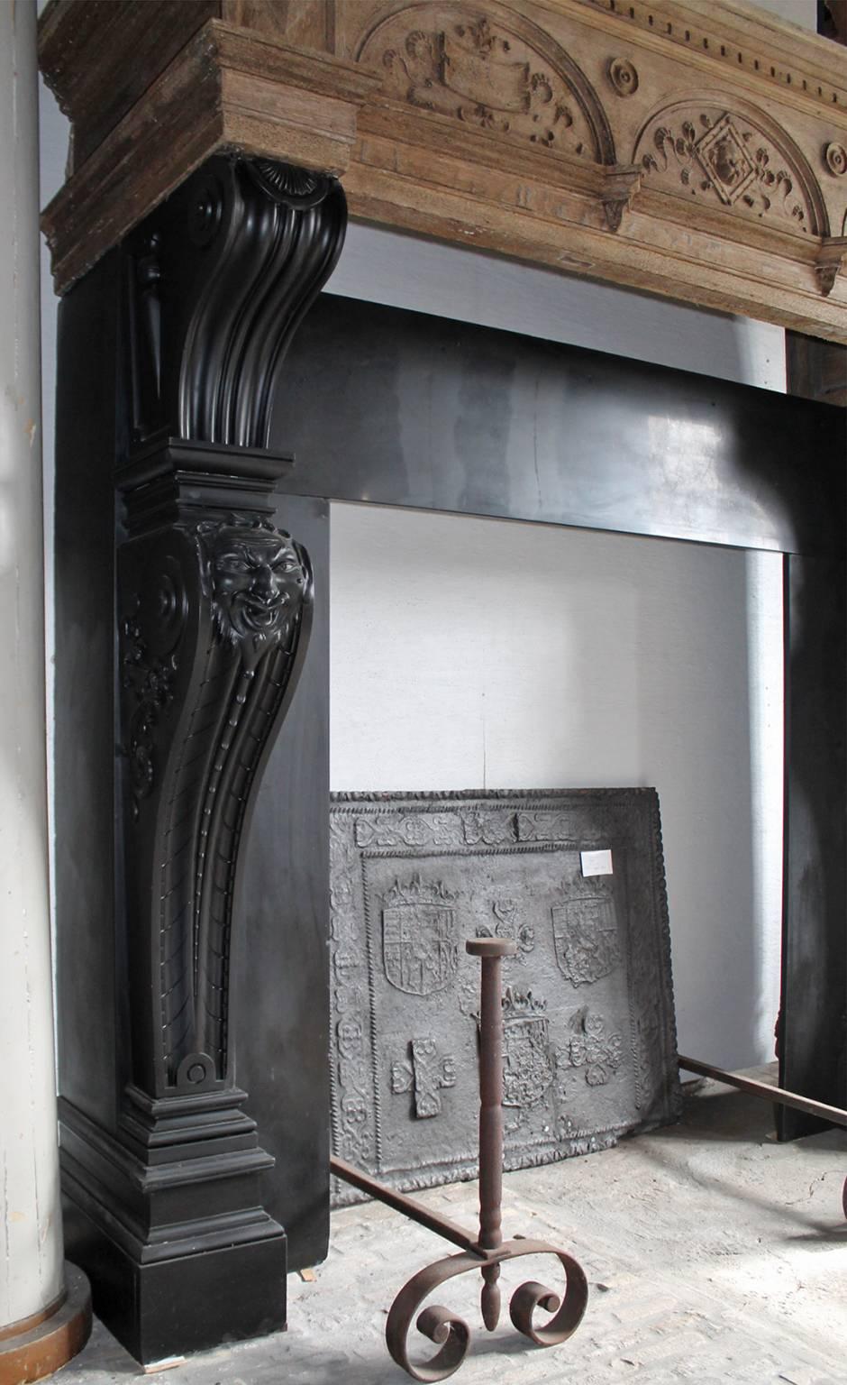 Dutch Antique Marble Fireplace with a Wooden Mantel on Top