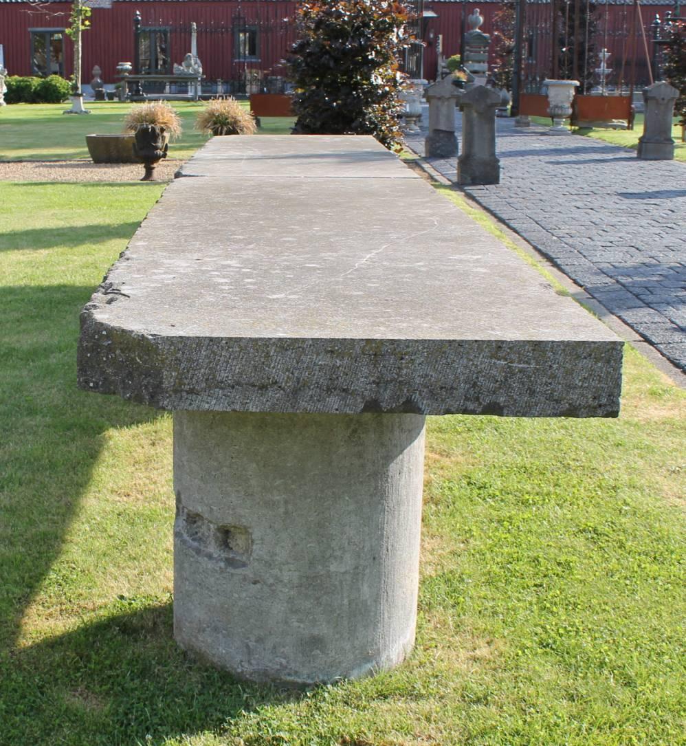 Very long Belgian bluestone garden table with antique Belgian bluestone columns.