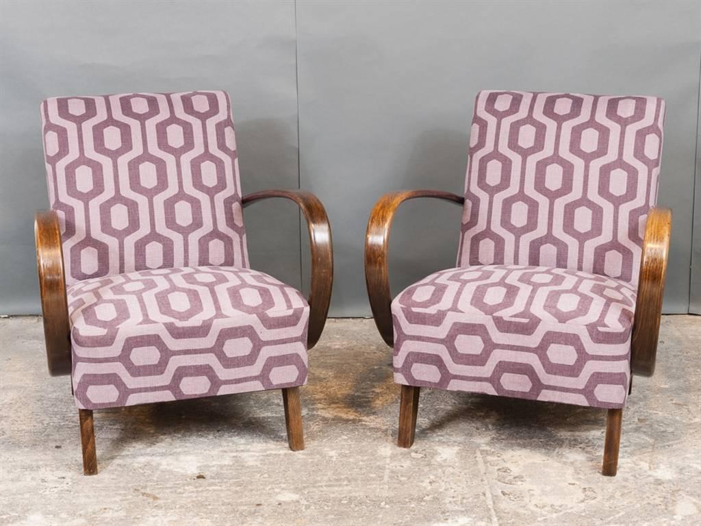 A stunning pair of Art Deco armchairs designed by Jindrich Halabala in the Czech Republic during the 1930s. Jindrich Halabala, one of the most prominent Czech furniture designers, worked for UP in Brno. Reupholstered in Romo Group's Kirkby Design