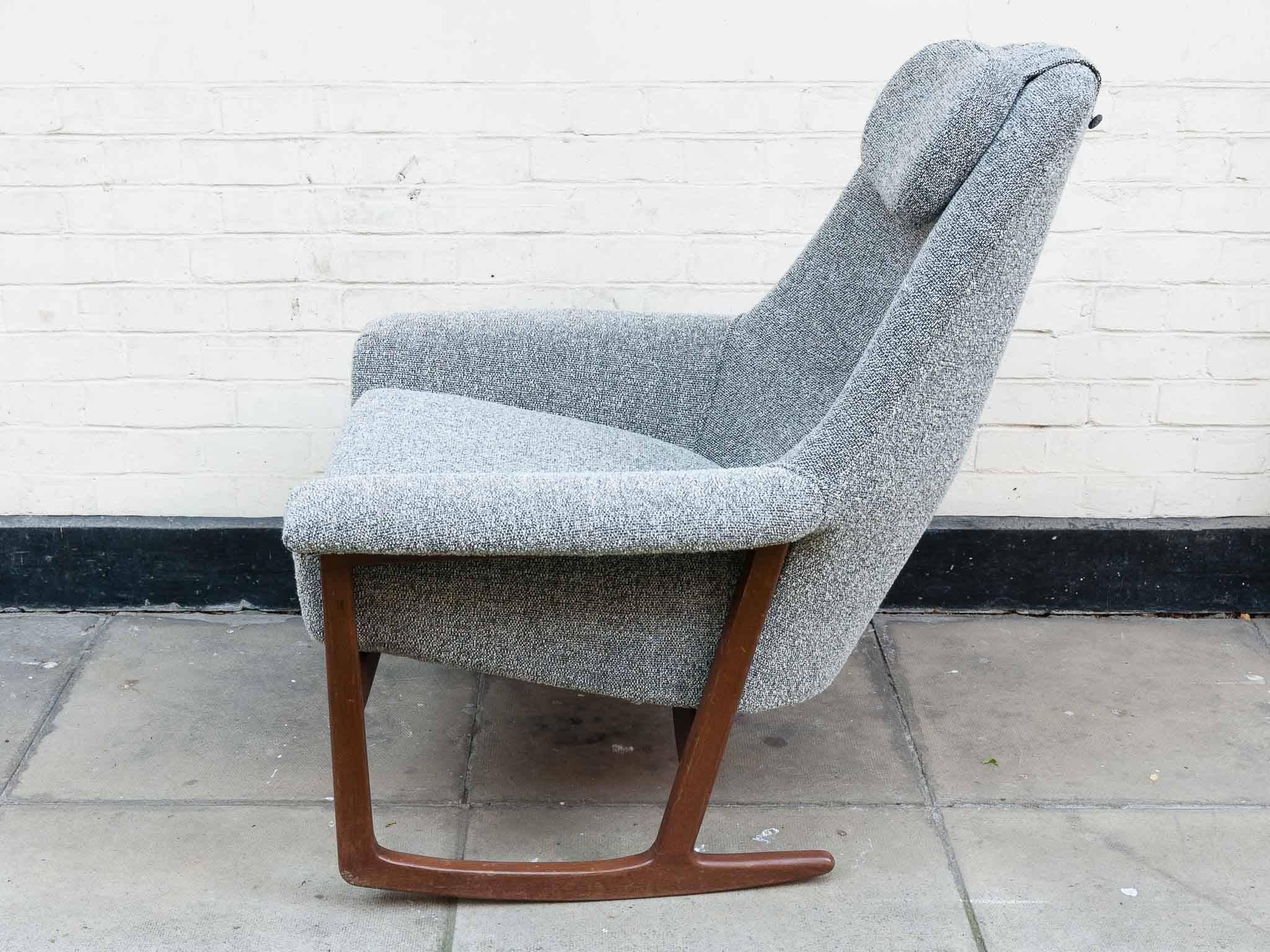 1960s Danish teak rocking chair restored and beautifully reupholstered in pure wool bouclé fabric by Bute Fabrics. Incredibly comfortable, stylish and functional. A wonderful long-lasting piece of furniture. Renowned upholster Stephen Moody M.A.