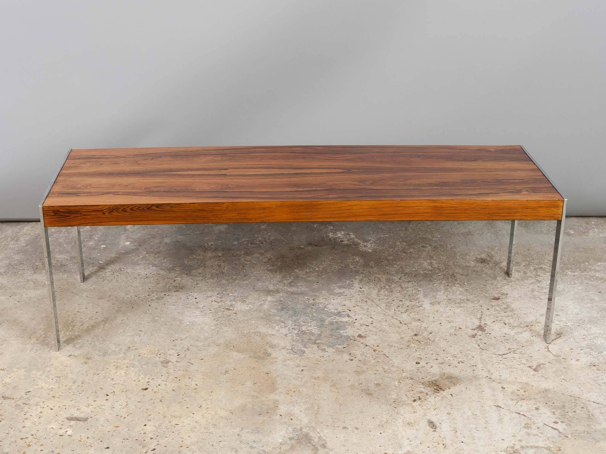 1970s Richard Young for Merrow associates rectangular Brazilian Rio rosewood veneered coffee table on chromed polished plated legs. Recently restored and in a beautiful vintage condition.