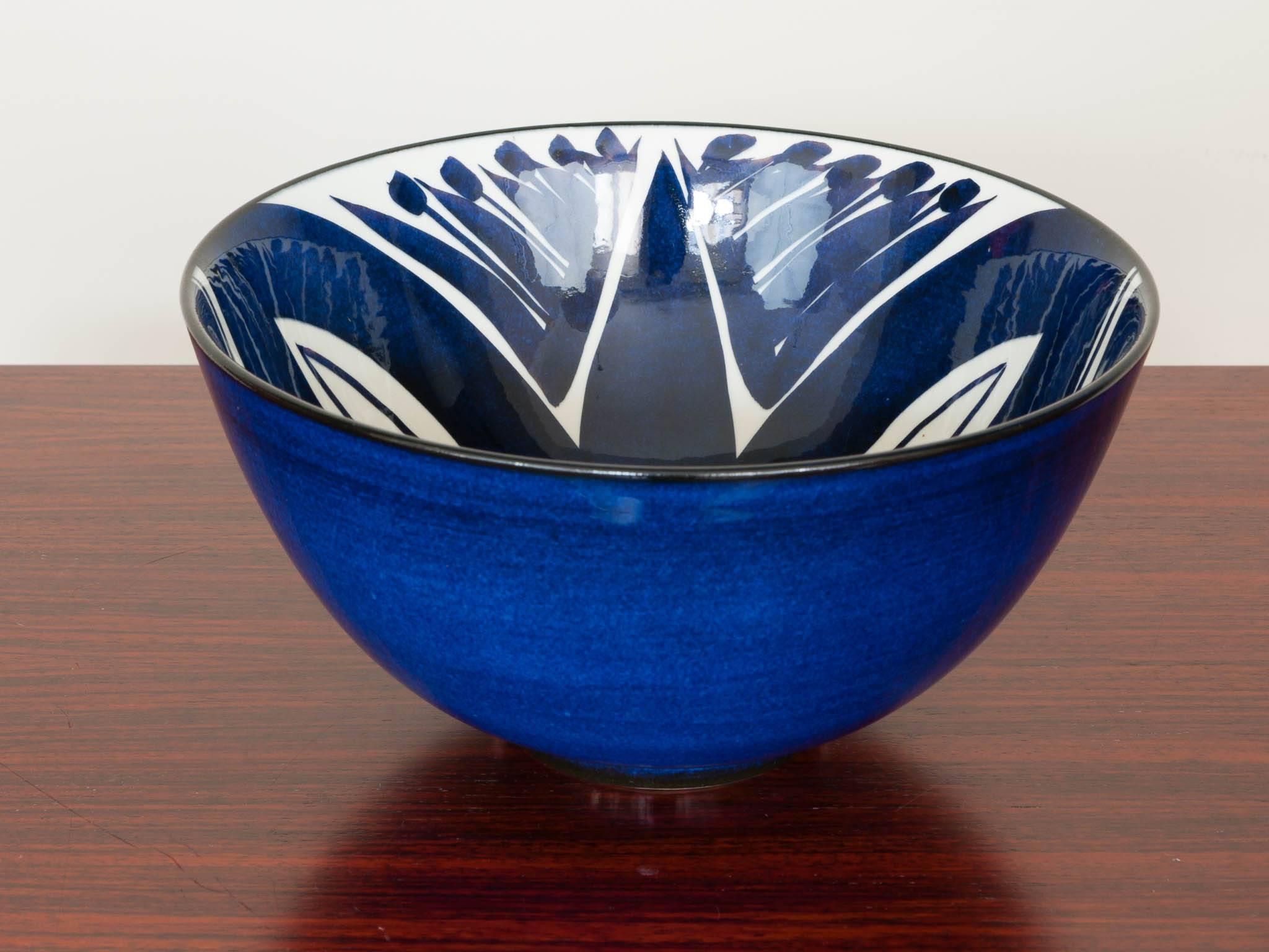 A stunning cobalt blue bowl from Royal Copenhagen, Denmark from the Aluminia Tenera series. Designed by Inge-Lise Koefoed. Marked on the base 136/2758 Fajance with the Inge-Lise Koefoed signature. It has no cracks or chips.