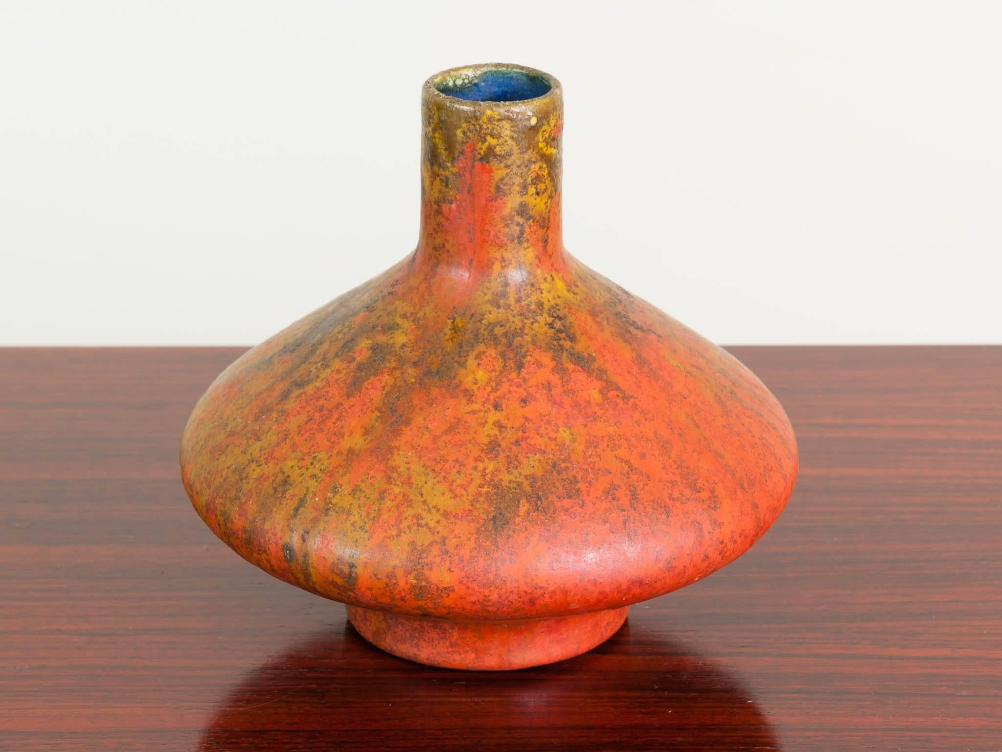 1970s UFO orange, brown and mustard fat lava vase manufactured by Otto Keramik and designed by Otto Gerharz. The base has been covered with a blue felt to help alleviate any potential scratches to whatever its placed on. In very good vintage