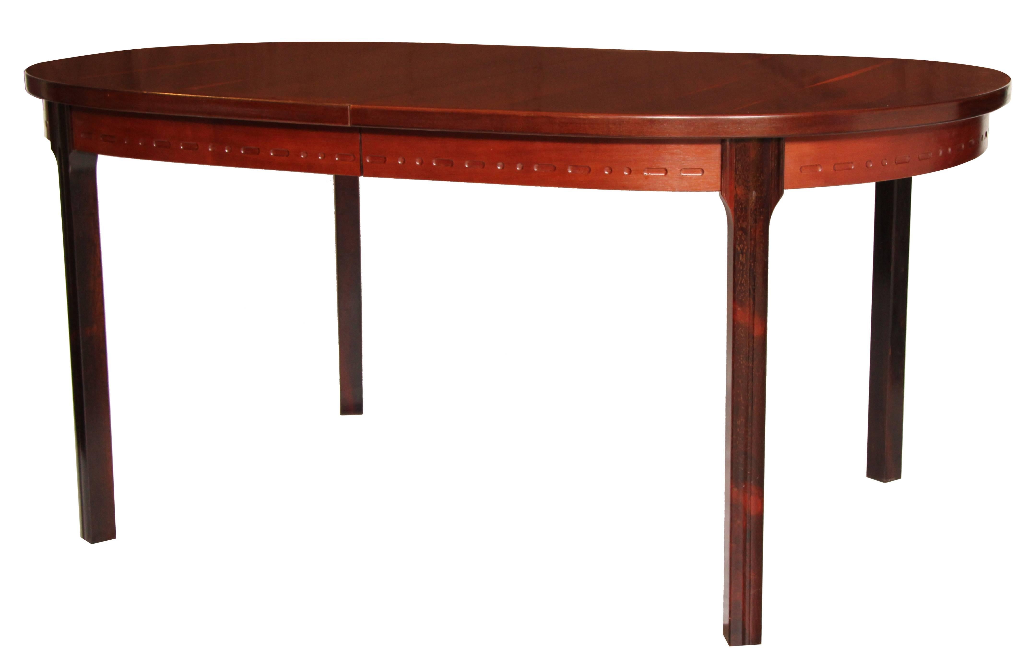 1960s Nils Jonsson for Troeds of Sweden rectangular extendable Rosewood dining table. The table has been completely restored and is in beautiful condition. The wood veneer tabletop has a wonderful grain which runs across the whole table. The table