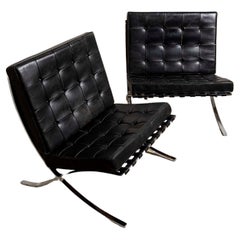 Pair of 1950s Mies van der Rohe Chrome and Black Leather Barcelona Chairs