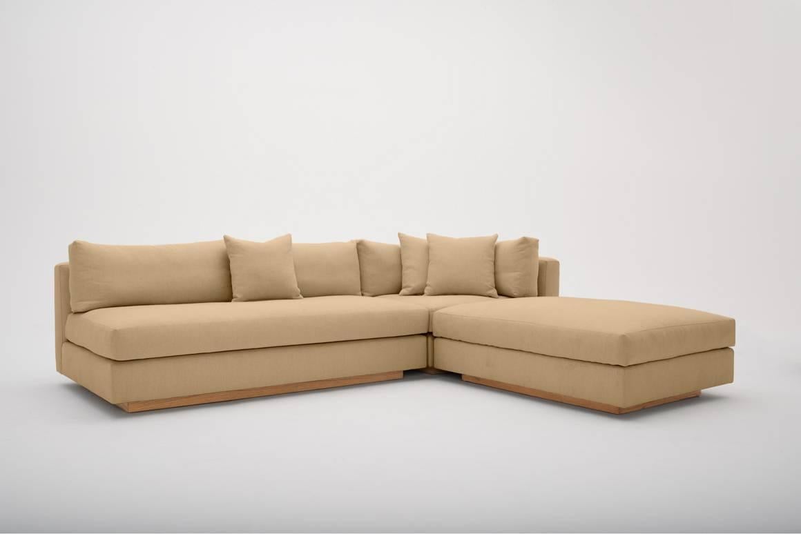 Versatility is the key to functionality with our PCH sofa. Made of Italian Linen, with feather and down fill, its several configurations adapt to the size and purpose of any room. Whether it is a bold statement of color to accent a room, or a subtle