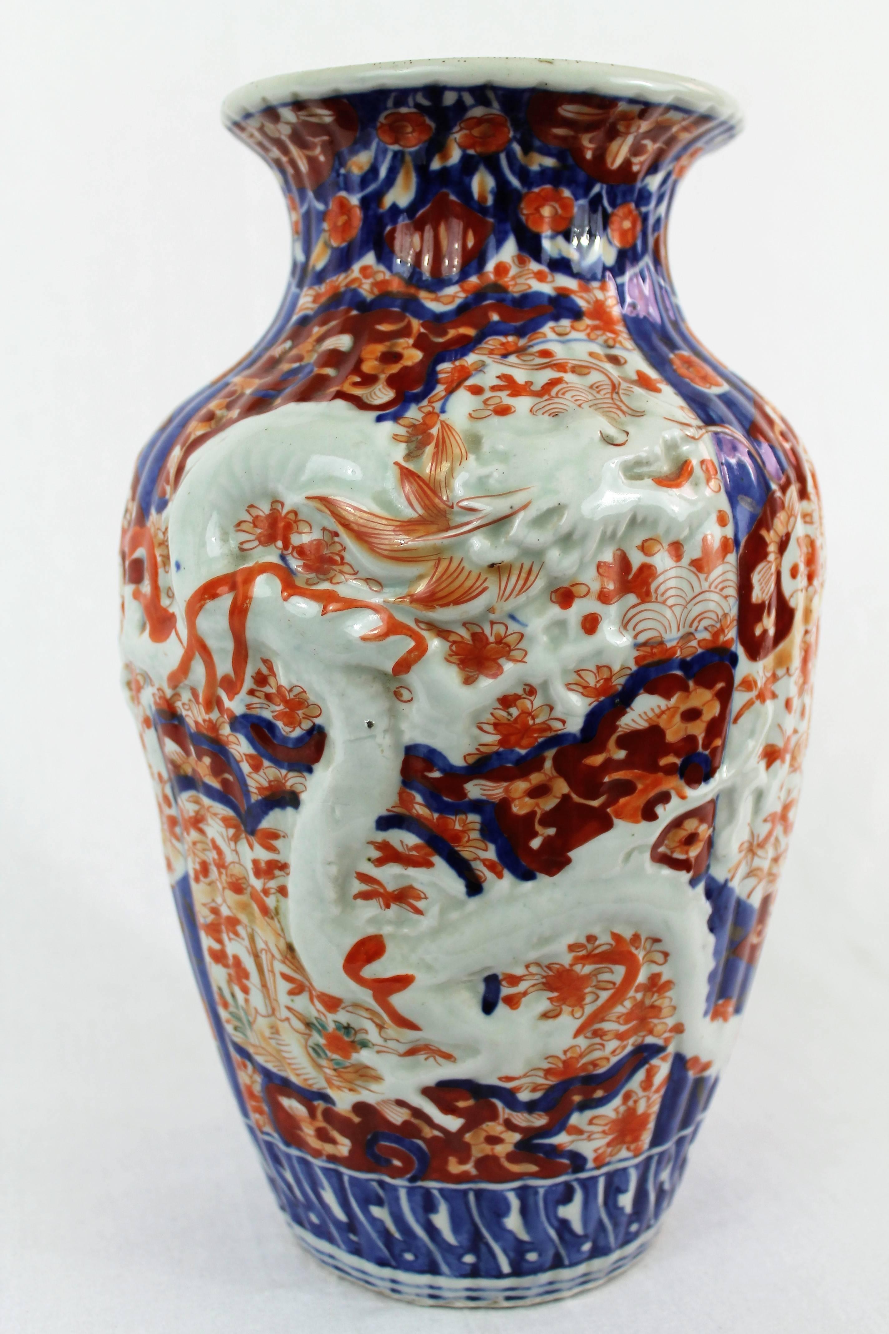 Meiji 19th Century Imari Porcelain Baluster Vase with Dragon Relief Decoration Japan For Sale