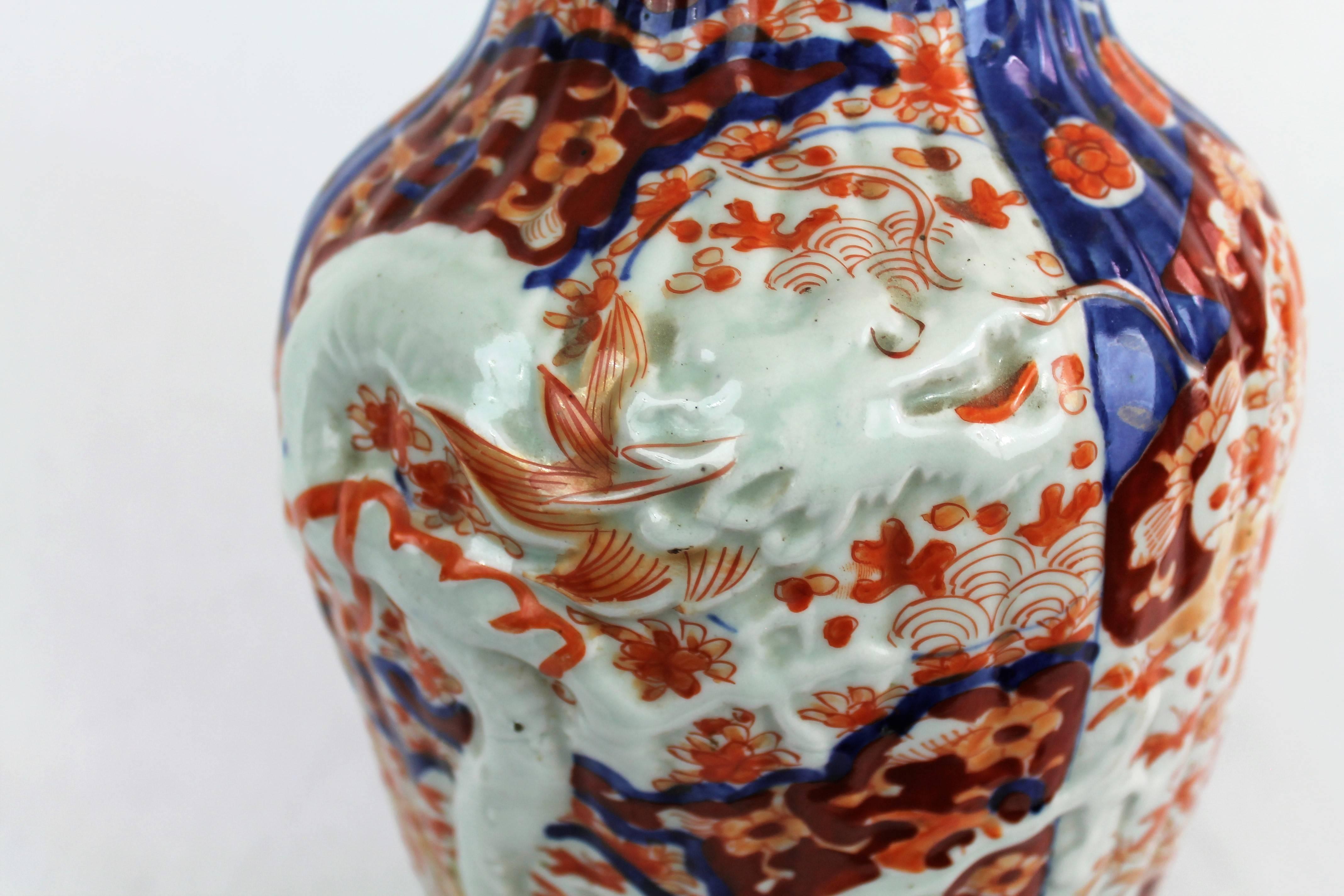 Japanese 19th Century Imari Porcelain Baluster Vase with Dragon Relief Decoration Japan For Sale