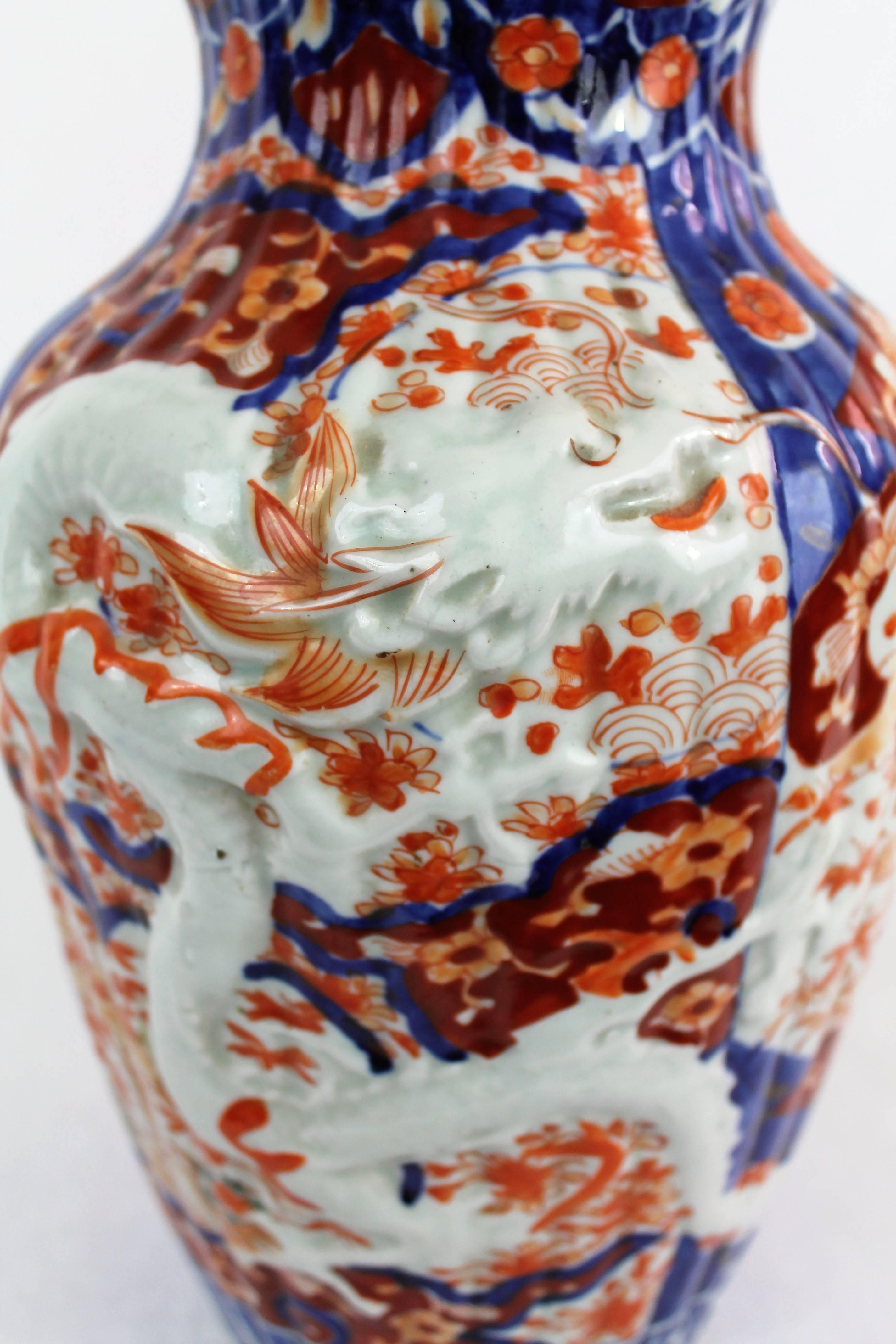 Enameled 19th Century Imari Porcelain Baluster Vase with Dragon Relief Decoration Japan For Sale