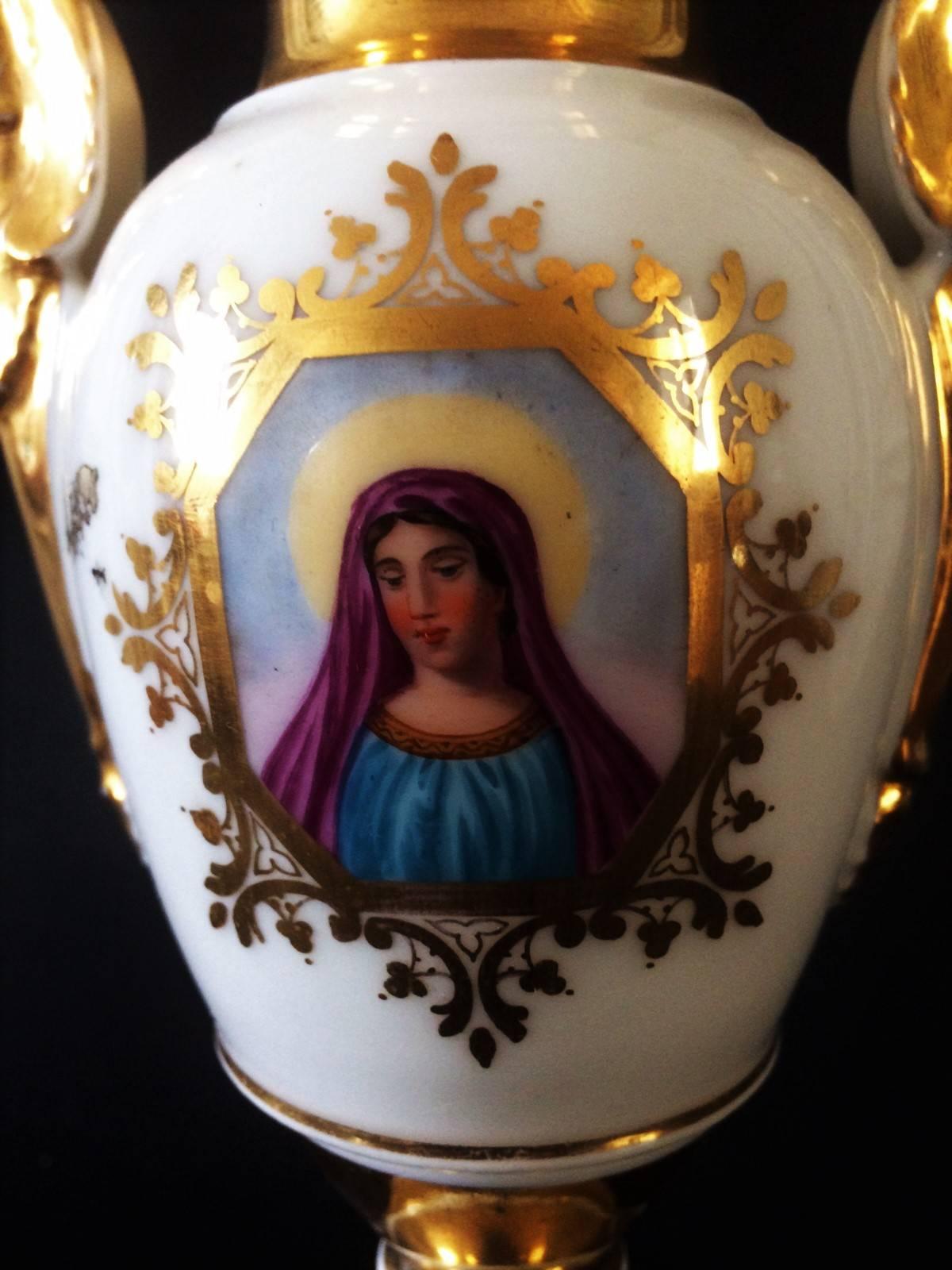 Charming Paris porcelain hotel vase of baluster shape, decorated with gilding and a portrait of the Virgin Mary hand painted in a reserve on the vase.
Effigy of Virgin Mary.
beautiful religious object.
France.
Napoleon III period.