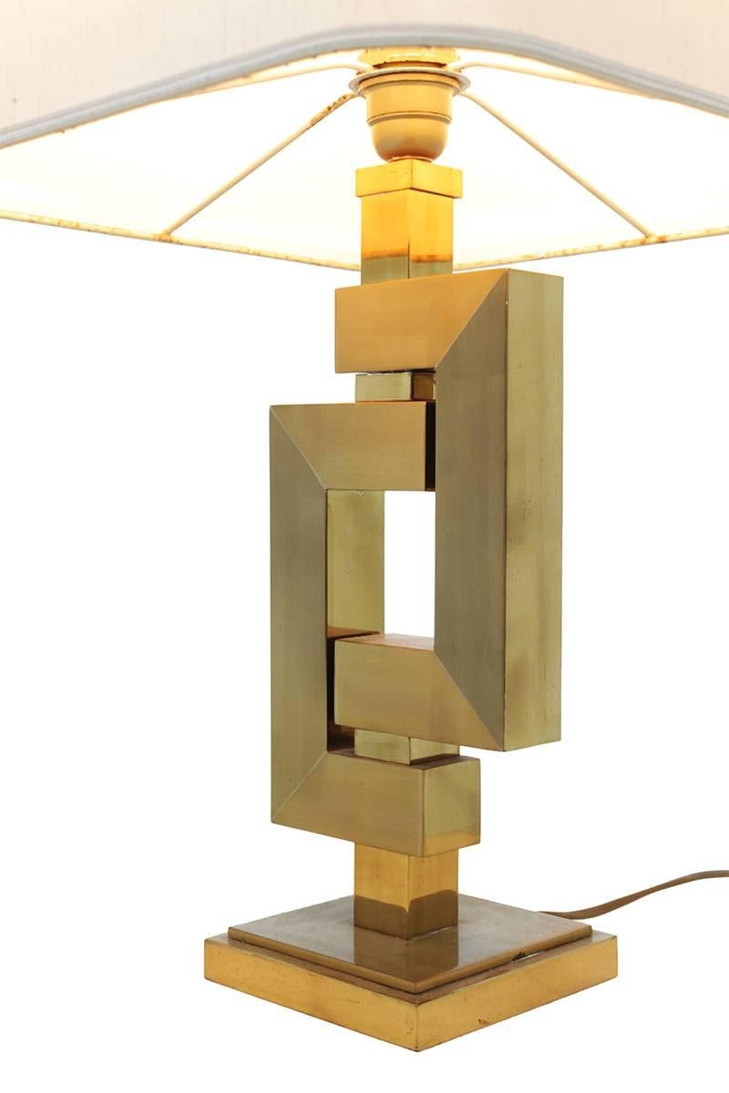 A classical style sculptured lamp, handcrafted in the 1970s by the Parisian design house Maison Jansen. Beautifully crafted in the shape of squares.
 