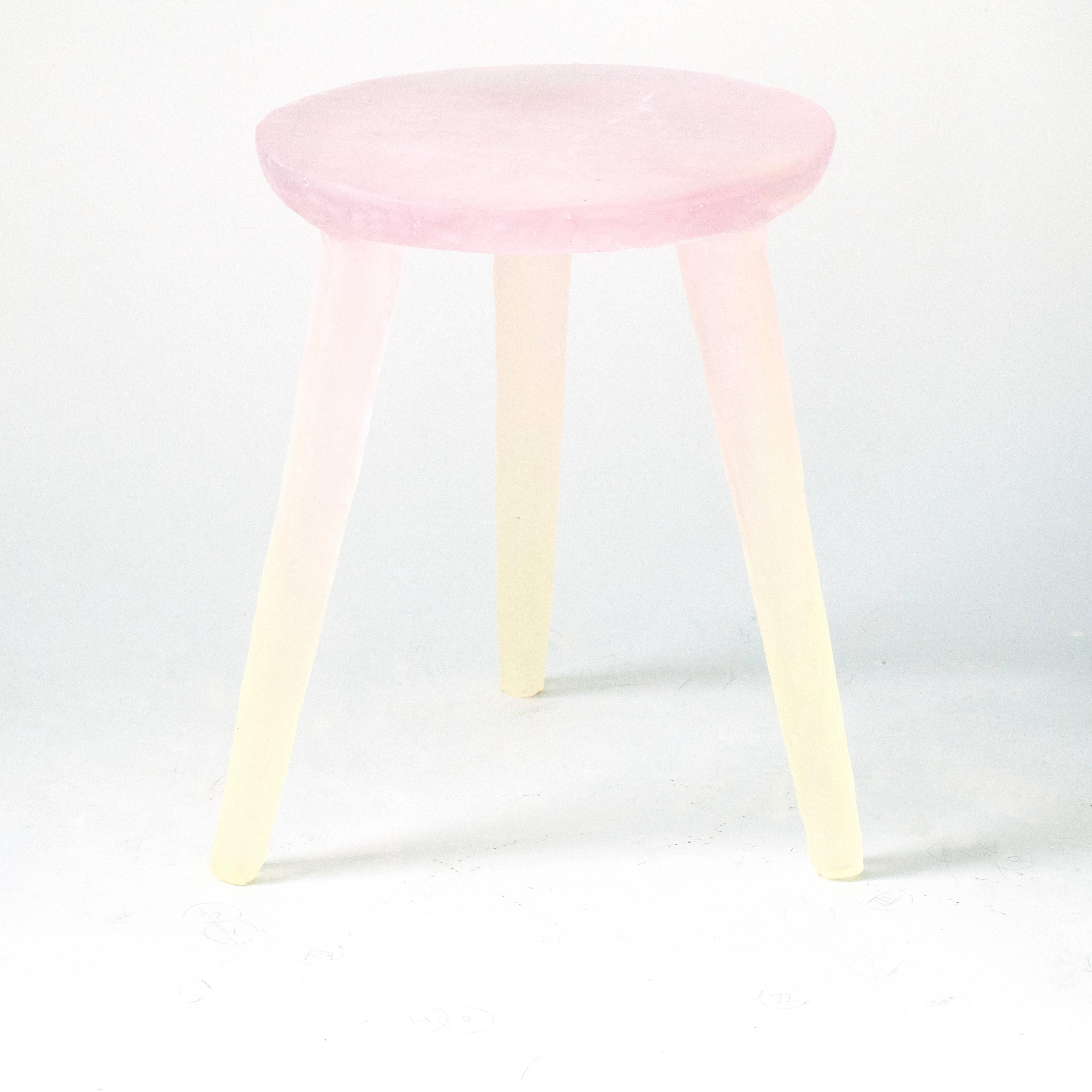 Translucent and whimsical, these can be used as side tables or stools. They are handcrafted from a variety of recycled plastics, both thermoset and thermoplastic. A specific blend of the plastics is combined in large molds. Once cured, the objects