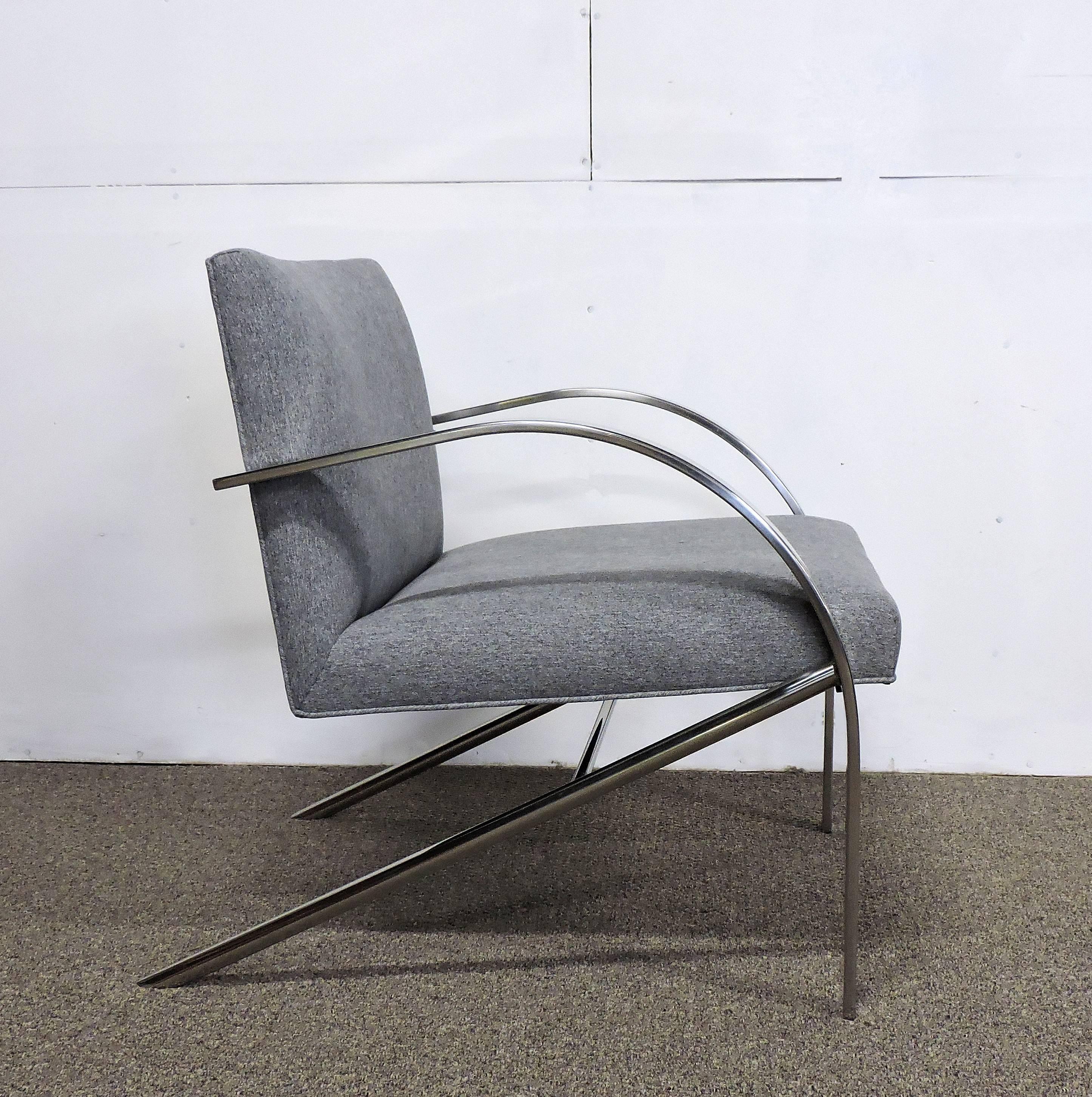Very cool and sleek lounge chair in the style of Paul Tuttle manufactured by high quality furniture maker, Bernhardt, Flair Division. This sturdy and well made chair has a chrome frame with all new grey fabric upholstery. Great look and very
