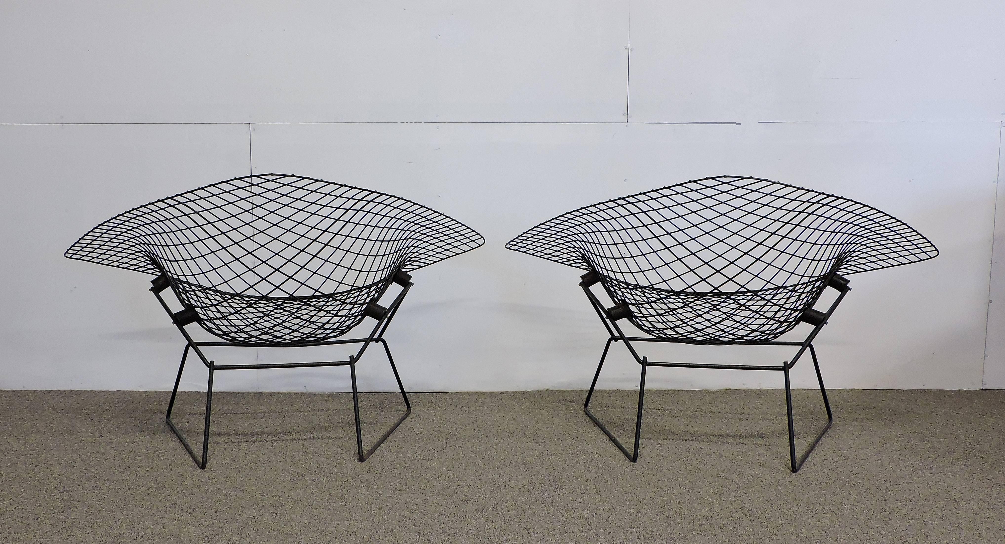 Super cool original large diamond chair designed by Harry Bertoia and manufactured by Knoll. This is the larger version of the diamond chair and has rubber shock mounts so that it can rock. The original black paint is in very good condition with