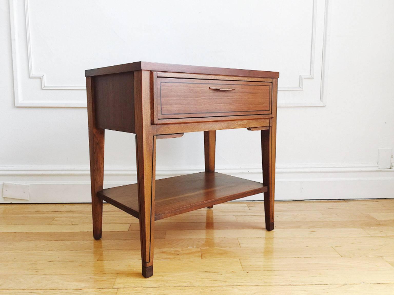 Art Deco-inspired, Mid-Century Modern nightstand, side table or end table from Kent Coffey's 'Tempo' line. Original sculpted pull, inlay detail and contrasting walnut and elmwood. In excellent vintage condition, drawer is clean and slides easily, no