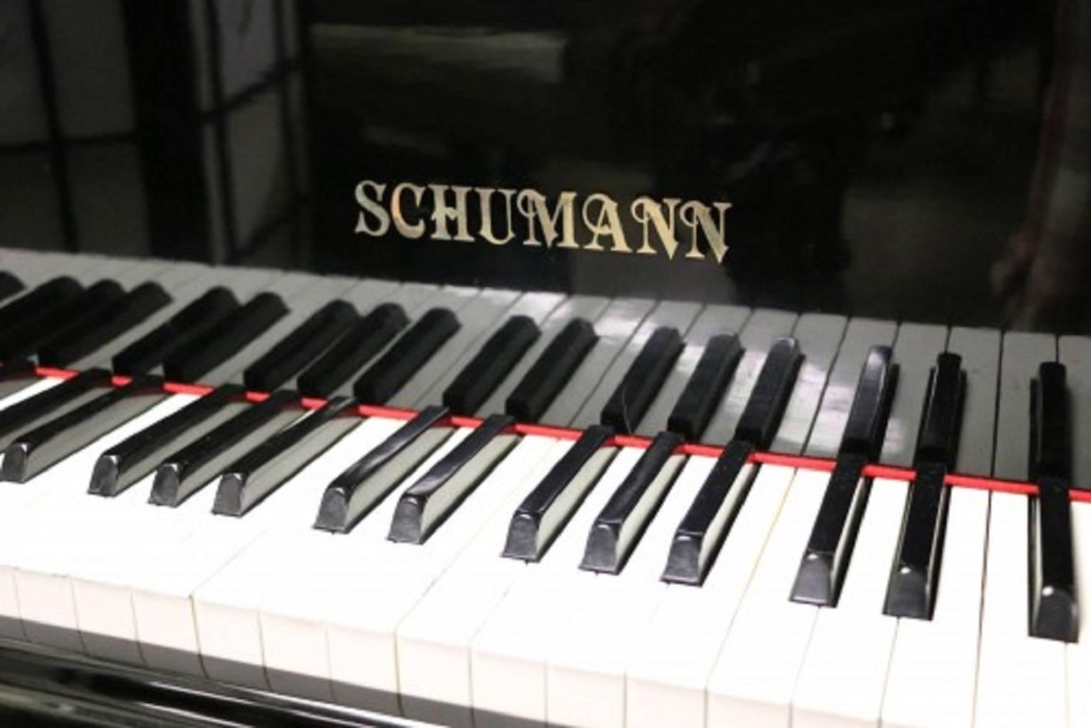 See and hear more about this magnificent piano on the video at the bottom of Sonny's Luxury Art case piano storefront homepage. 

Great sounding Schumann ebony gloss 5' Baby Grand piano. Piano made by Samick in 1984. Low mileage, served as a