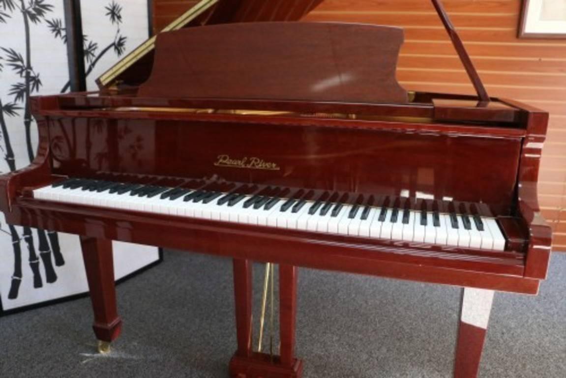 See and hear more about this magnificent piano on the video at the bottom of Sonny's Luxury Art case piano storefront homepage. 

Beautiful, pristine, exquisite, red gloss mahogany 