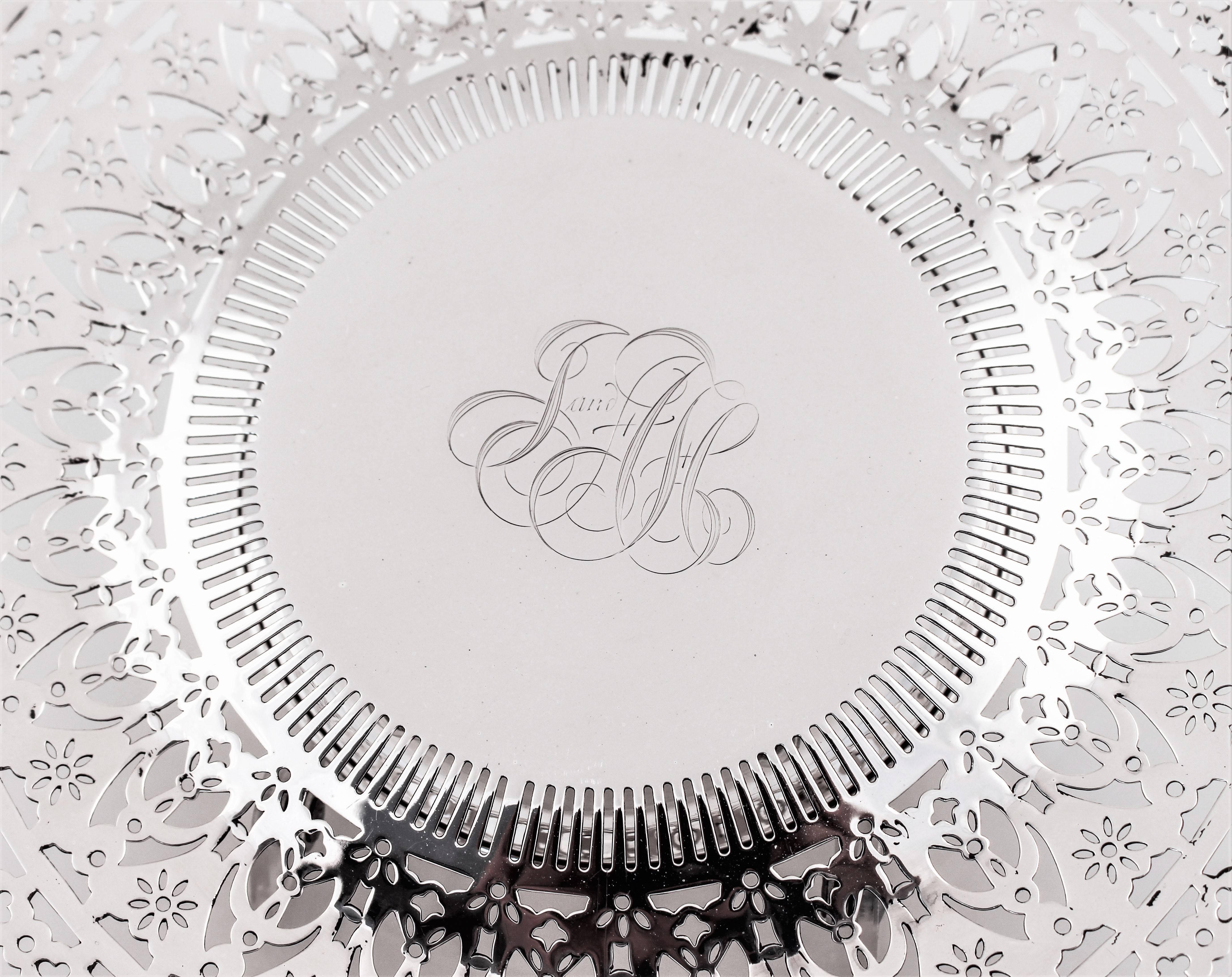 Lovely symmetrical openwork encircles this tray giving it a richness and beauty of its own.
  