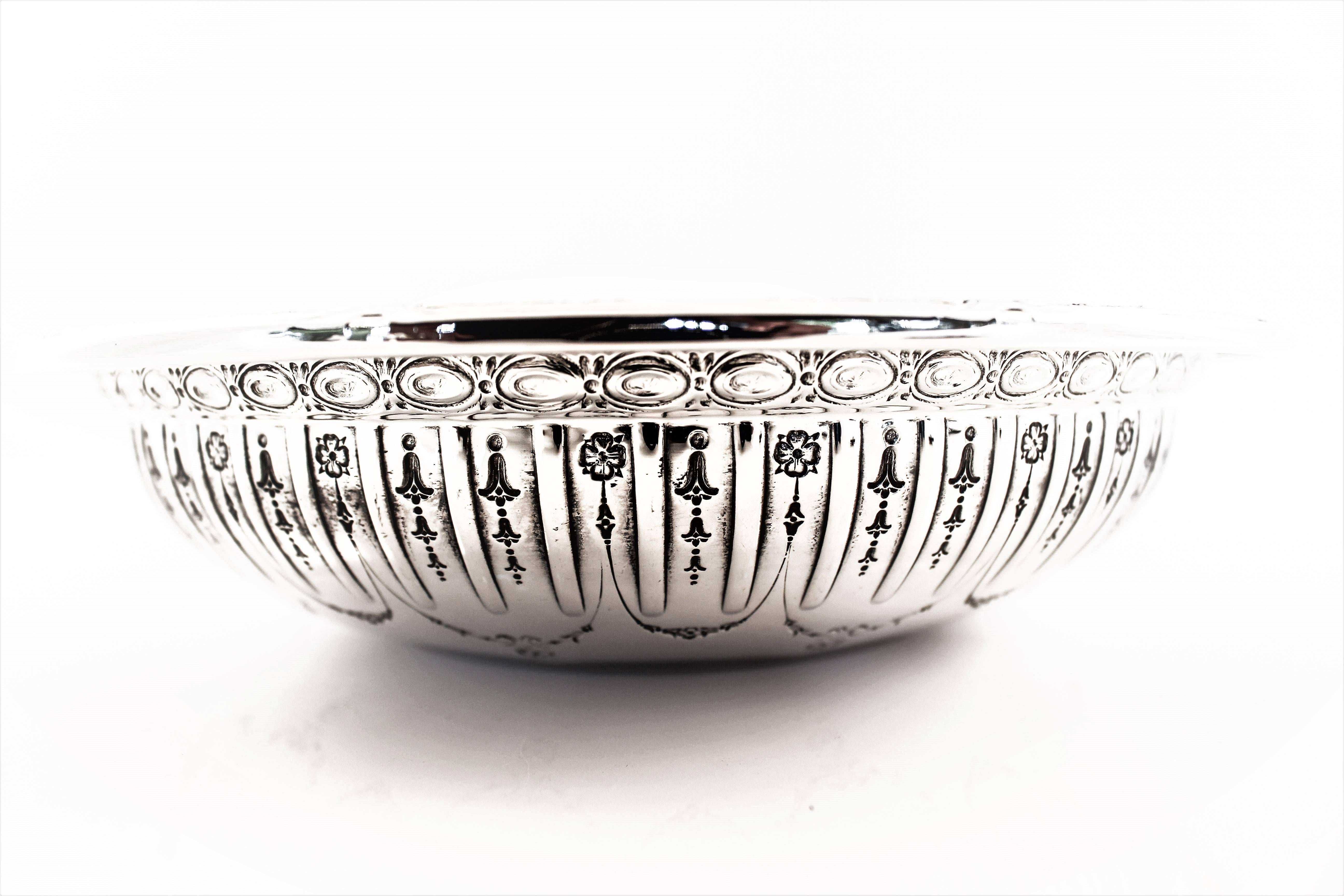 True to it’s name, this bowl is decadent and rich in design. Floral wreaths drape the interior and exterior of the bowl while an oval shaped motif encircles the very top. Makes a great wedding or anniversary gift and is the perfect size for everyday