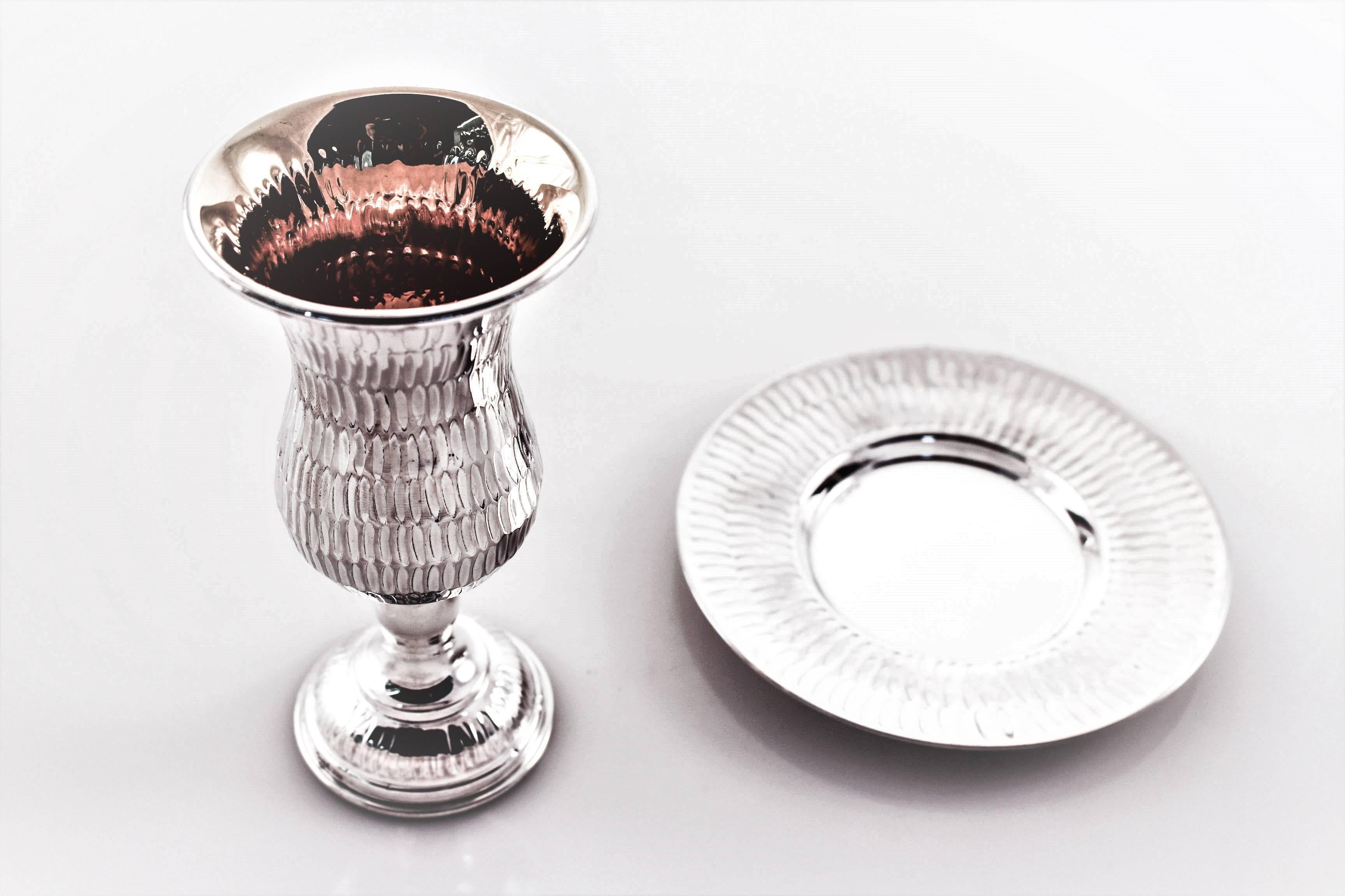 The traditions may be thousands of years old but the look is very contemporary! This lovely goblet and plate have a young, modern feel. A hammered-like texture that looks like snake skin. Great for your sabbath and holiday dinners. L’Chaim!