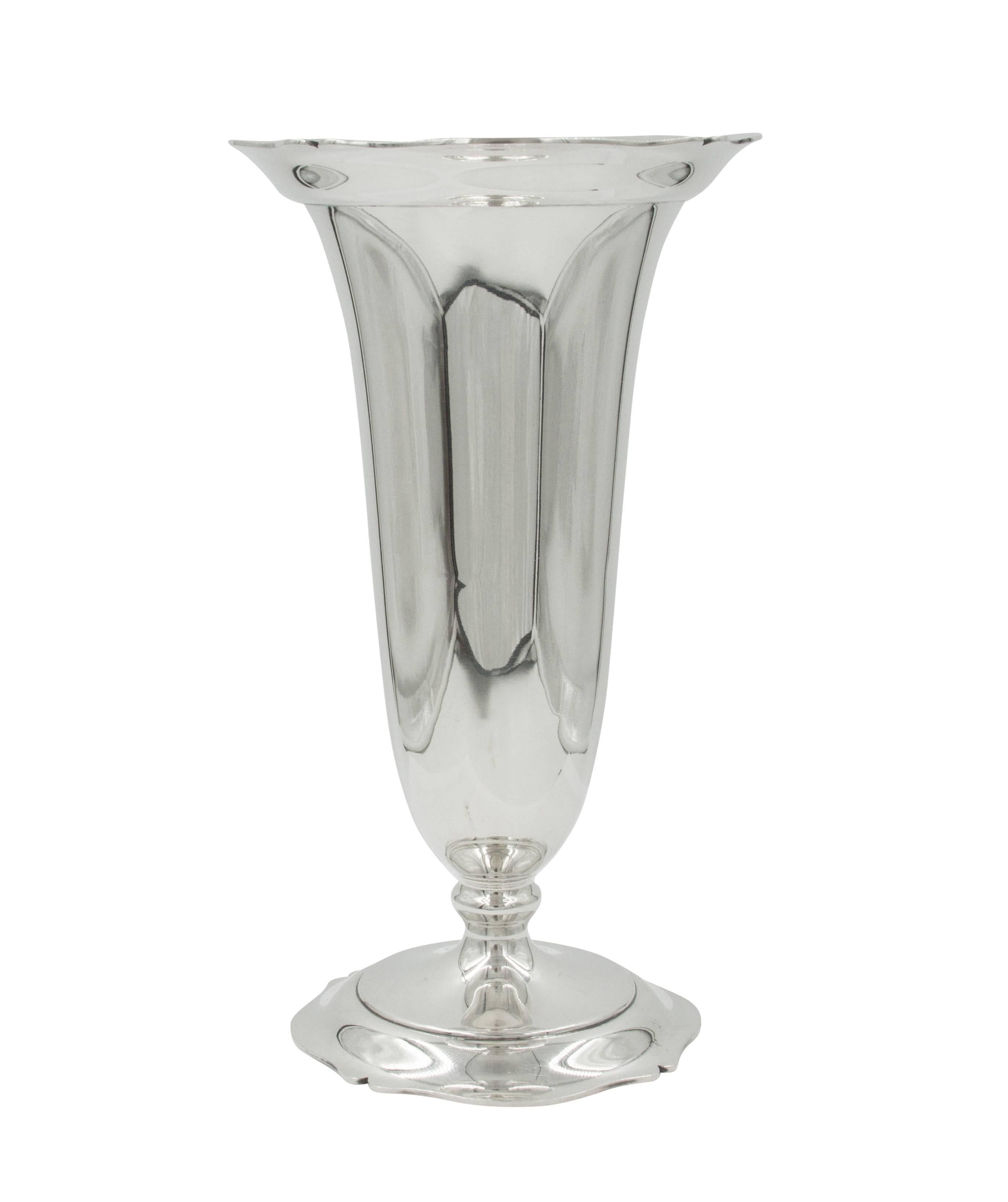 The word antique usually conjures images of your grandmothers collectibles; ornate or old-looking items. Well these vases by Wallace Silversmiths in the Antique pattern are anything but! They have a modern, young look: scalloping around both the top