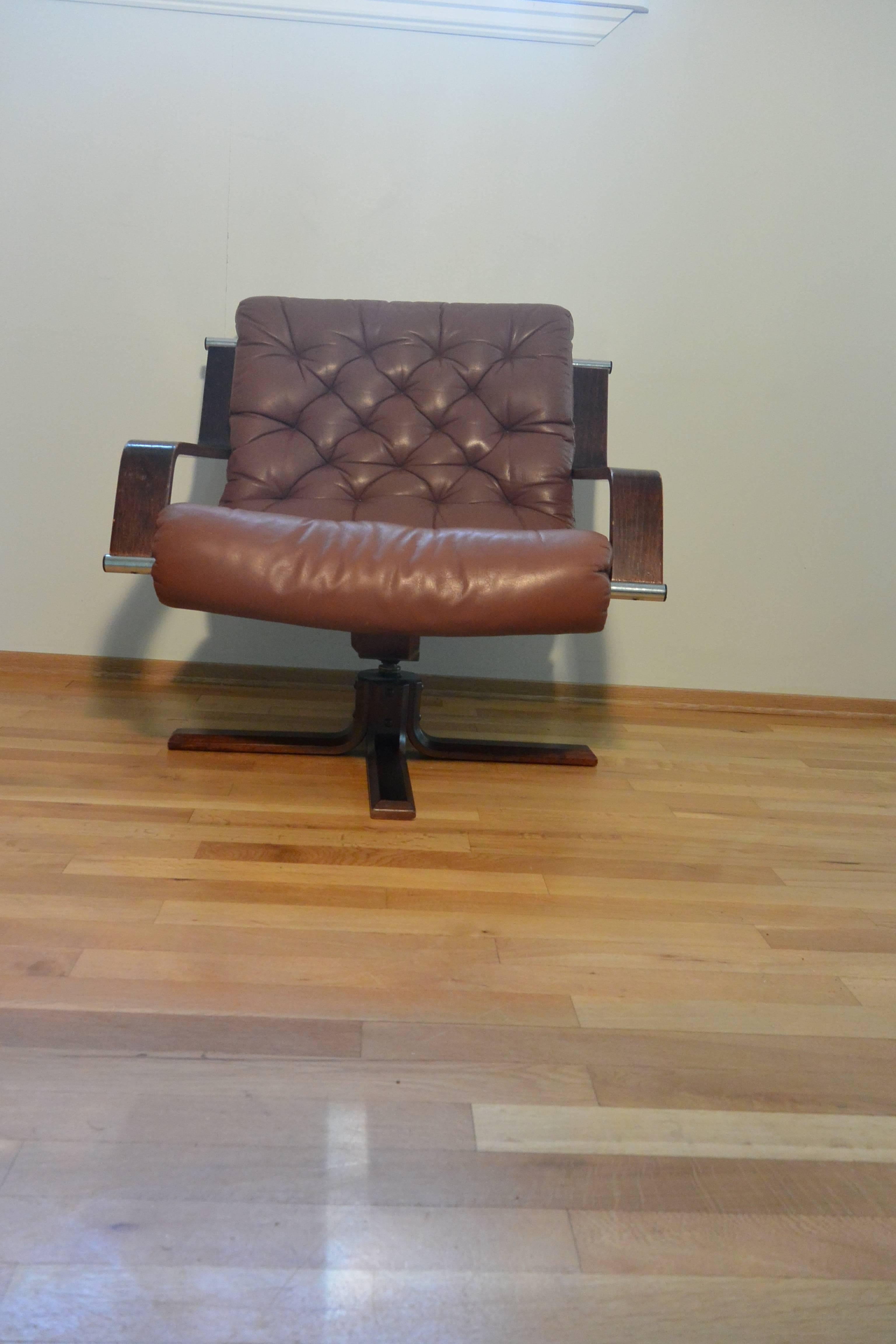 Scandinavian Modern Rare Cognac Leather Norwegian Woodman Swivel Chair by Sigurd Ressell For Sale